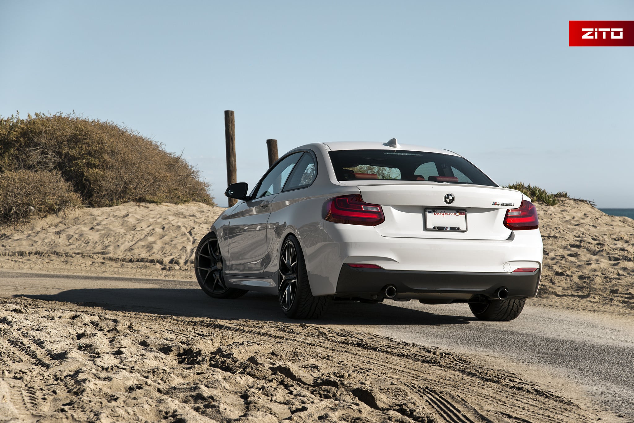 White BMW 2-Series with Custom Red LED Taillights - Photo by Zito Wheels