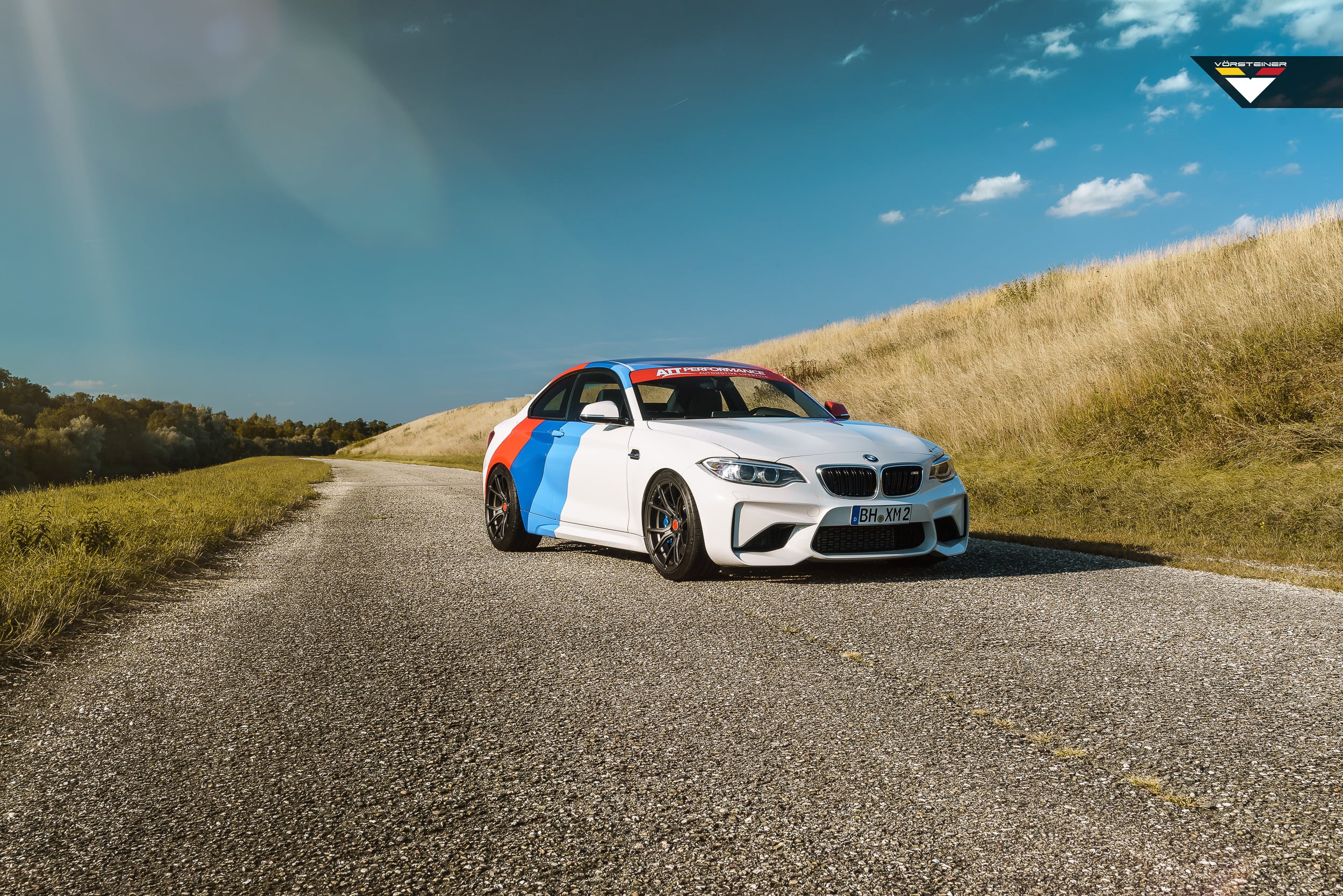 White BMW 2-Series with Custom Projector Headlights - Photo by Vorstiner