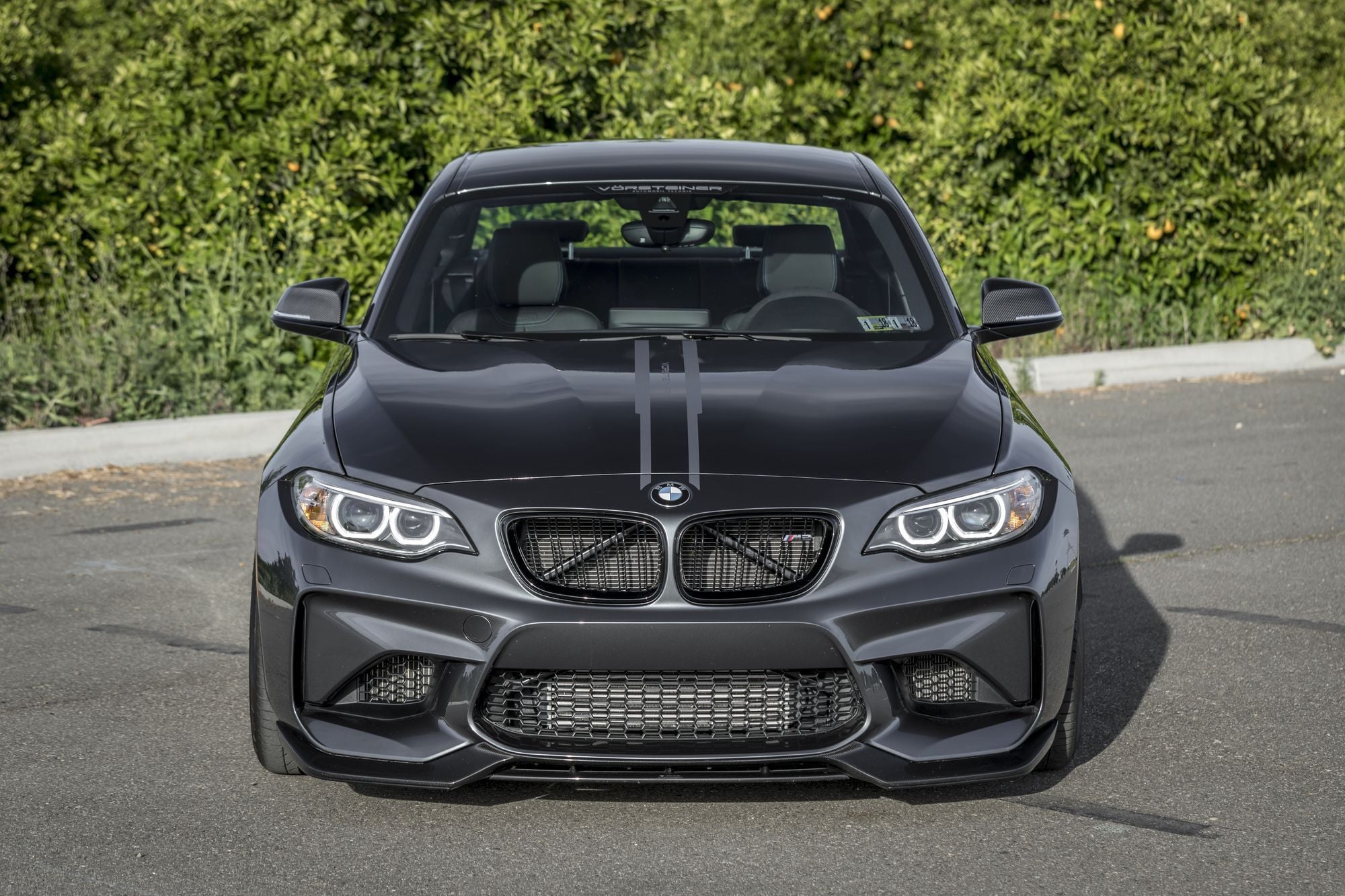 Black BMW 2-Series with Aftermarket Hood - Photo by Vorstiner