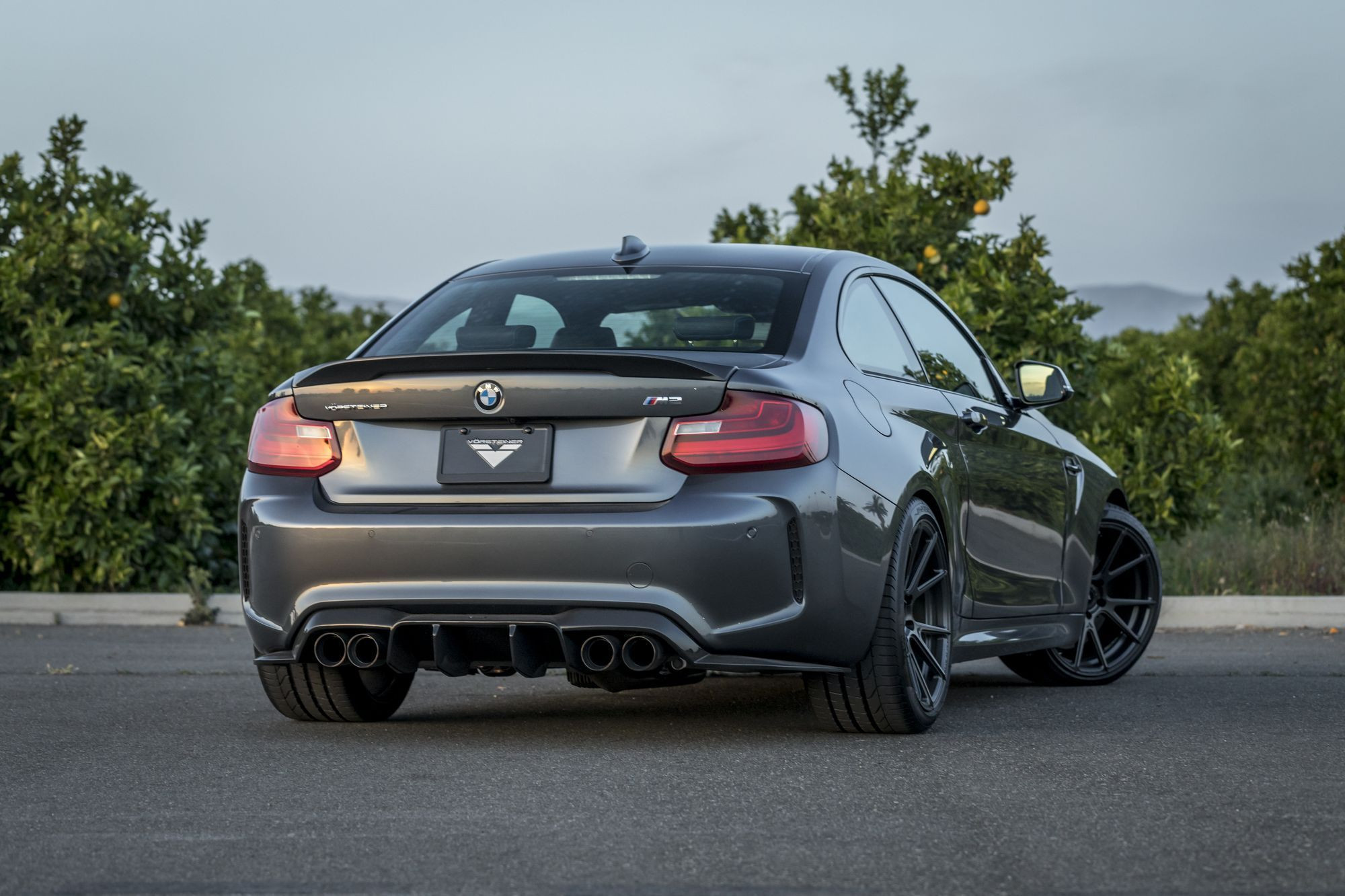 Factory Style Lip Spoiler on Black BMW 2-Series - Photo by Vorstiner