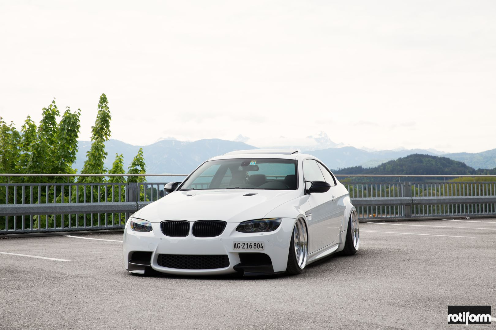 White Stanced BMW 3-Series with Dark Smoke Headlights - Photo by Rotiform