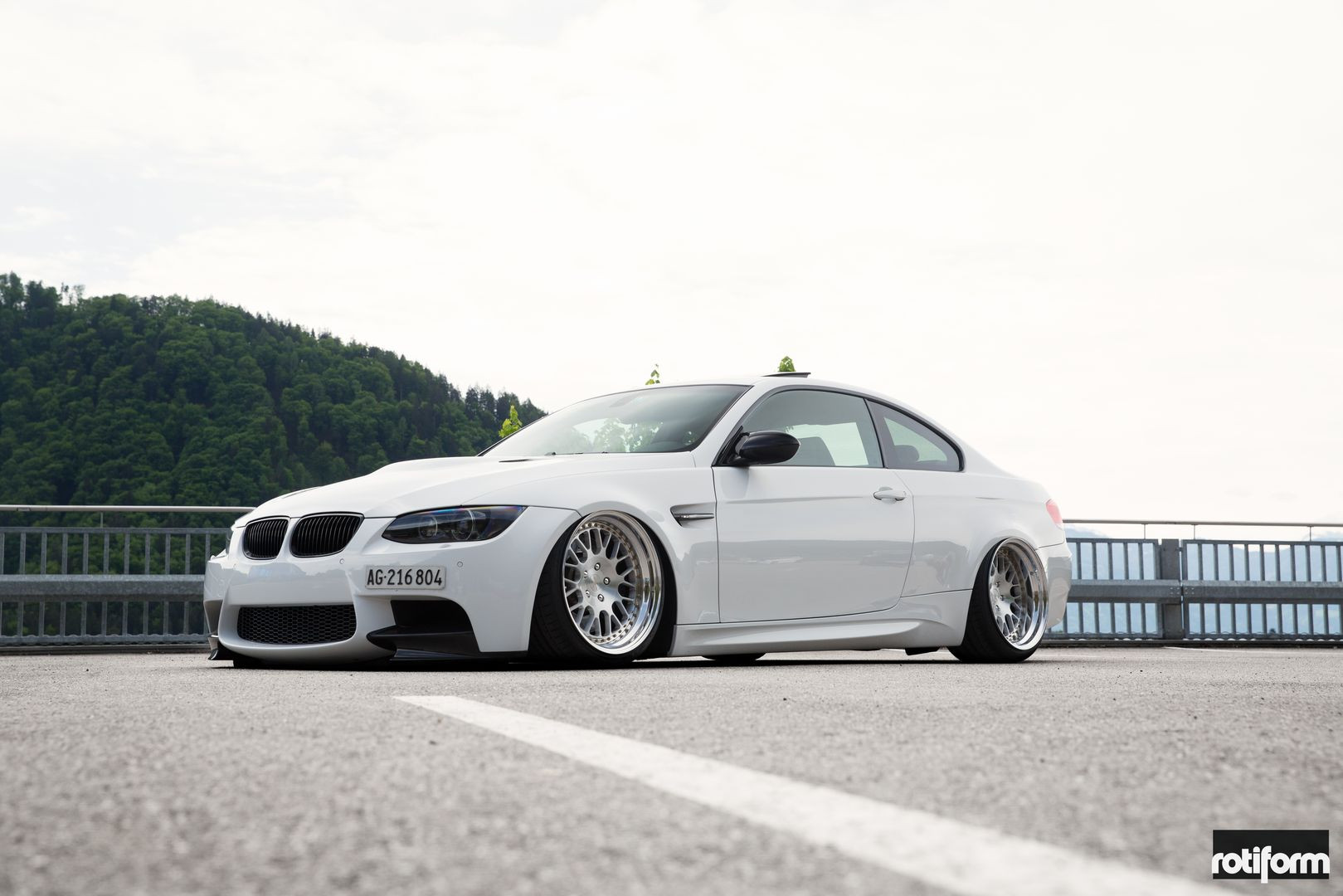 Custom Front Bumper Lips on White BMW 3-Series - Photo by Rotiform