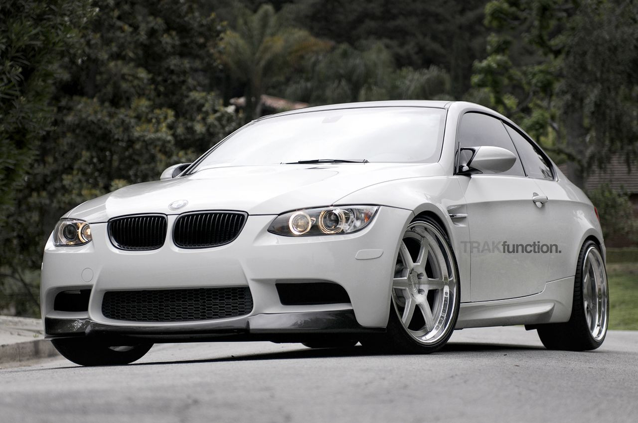 White BMW 3-Series with Aftermarket Front Lip - Photo by ADV.1