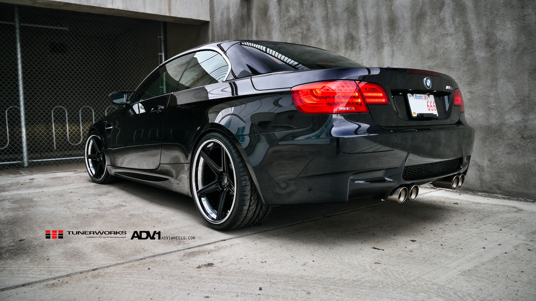 Black BMW M3 with Aftermarket Exhaust System - Photo by ADV.1