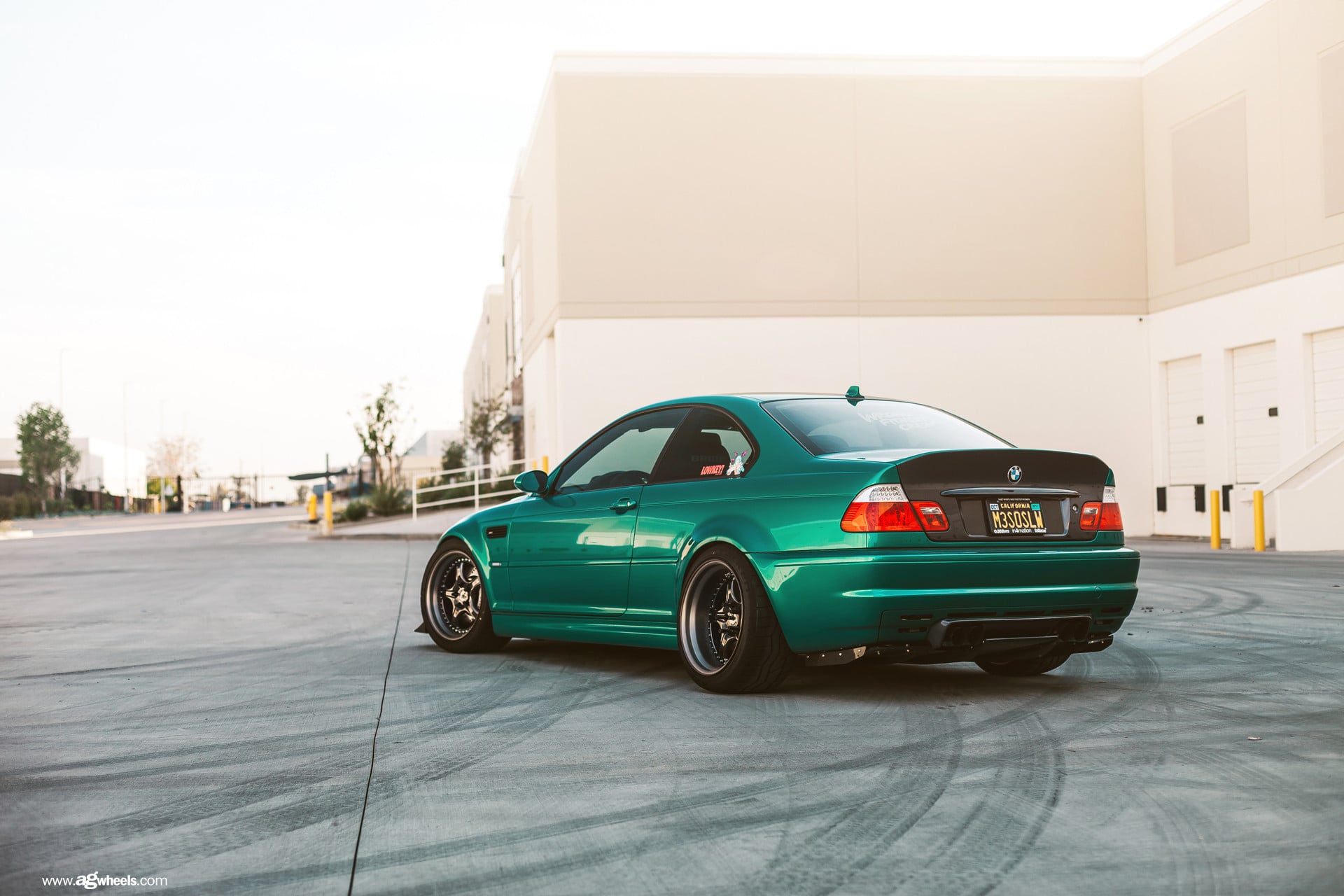 Aftermarket Rear Bumper on Green BMW 3-Series - Photo by Avant Garde Wheels
