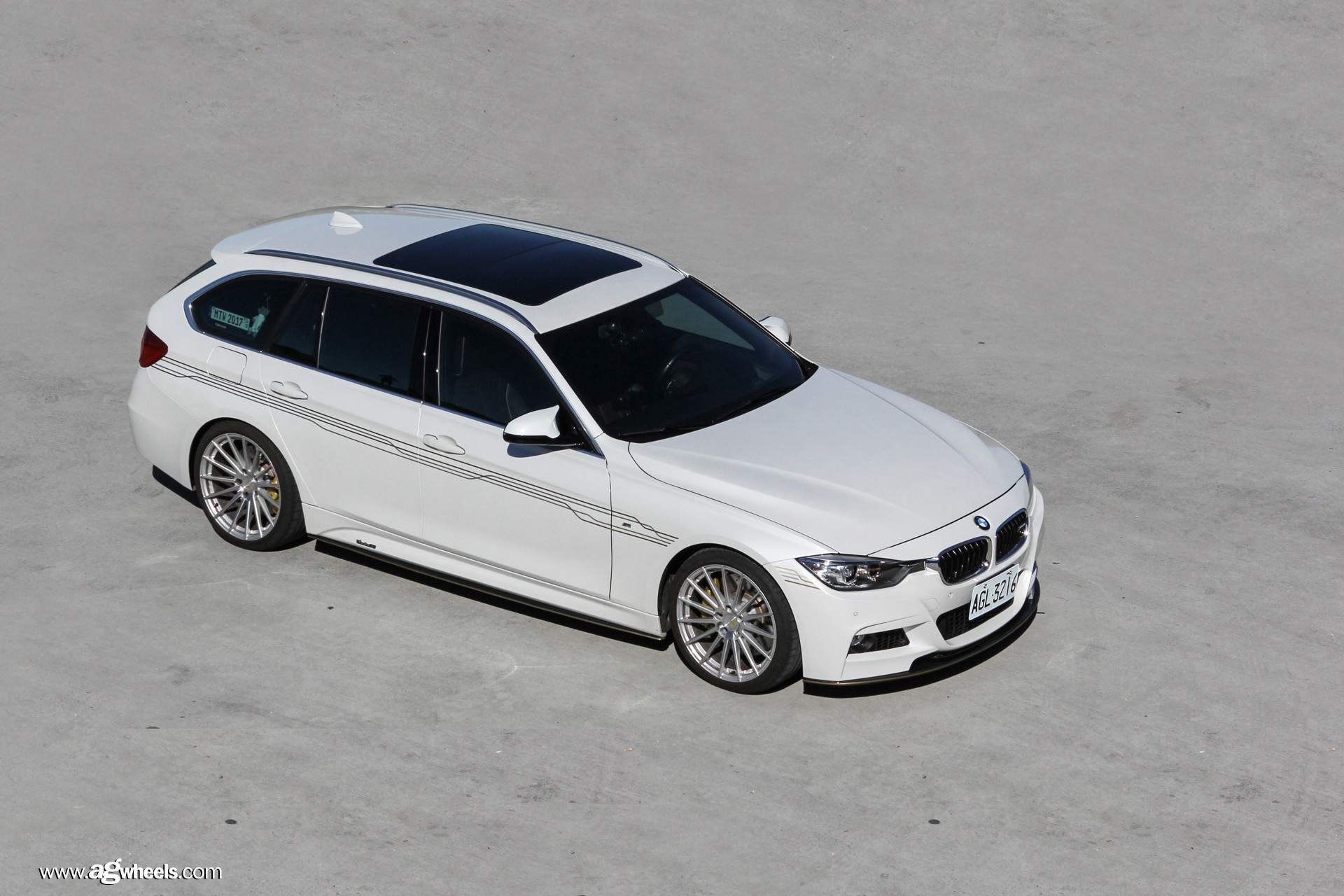 Chrome Avant Garde Wheels on White BMW 3-Series - Photo by Avant Garde Wheels