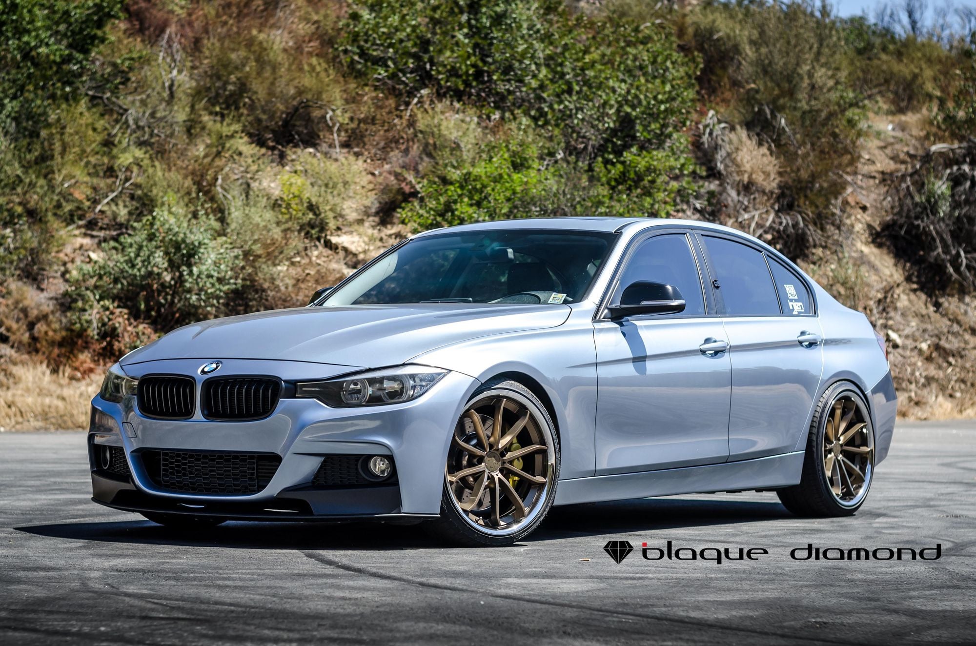 Gray BMW 3-Series with Custom Projector Headlights - Photo by Blaque Diamond