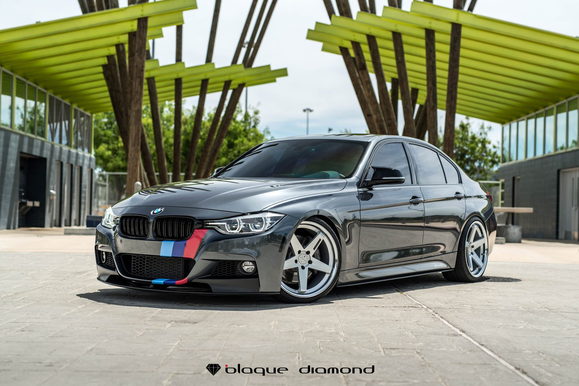 Front Bumper with Fog Lights on Gray BMW 3-Series - Photo by Blaque Diamond
