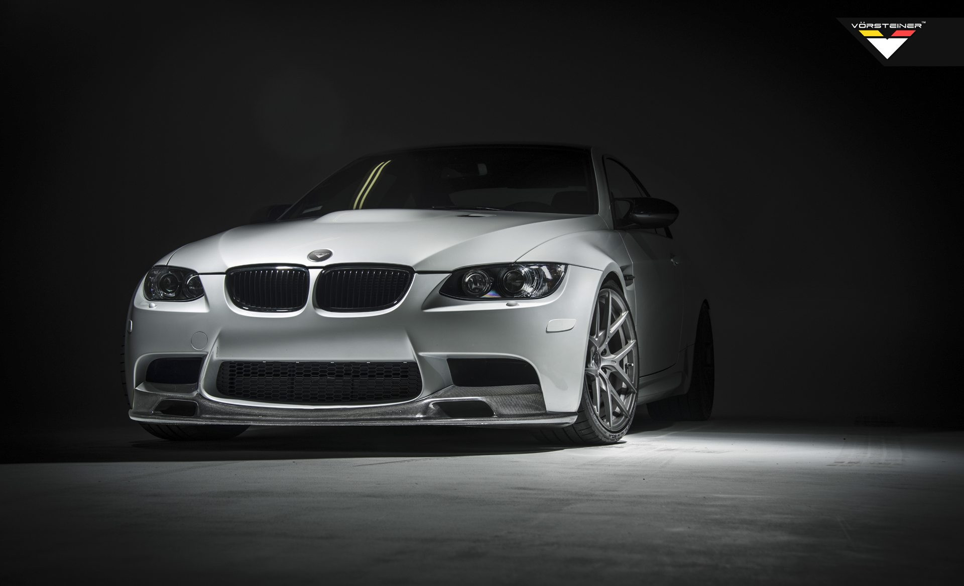 White BMW 3-Series with Custom Carbon Fiber Front Lip - Photo by Vorsteiner