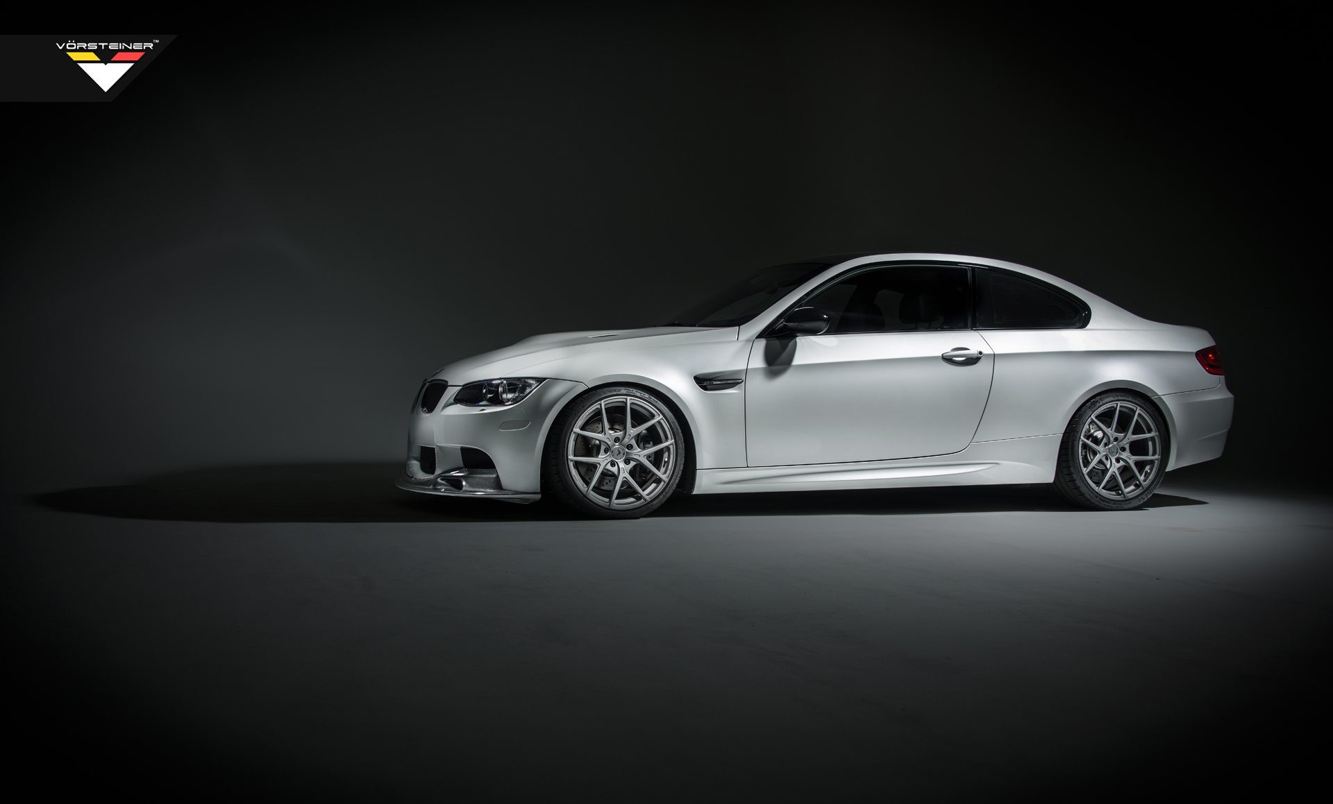 Aftermarket Side Skirts on White BMW 3-Series - Photo by Vorsteiner