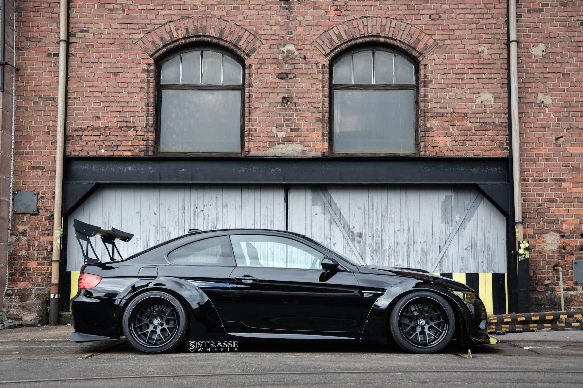 Black BMW 3-Series with Wide Fender Flares - Photo by Strasse Forged