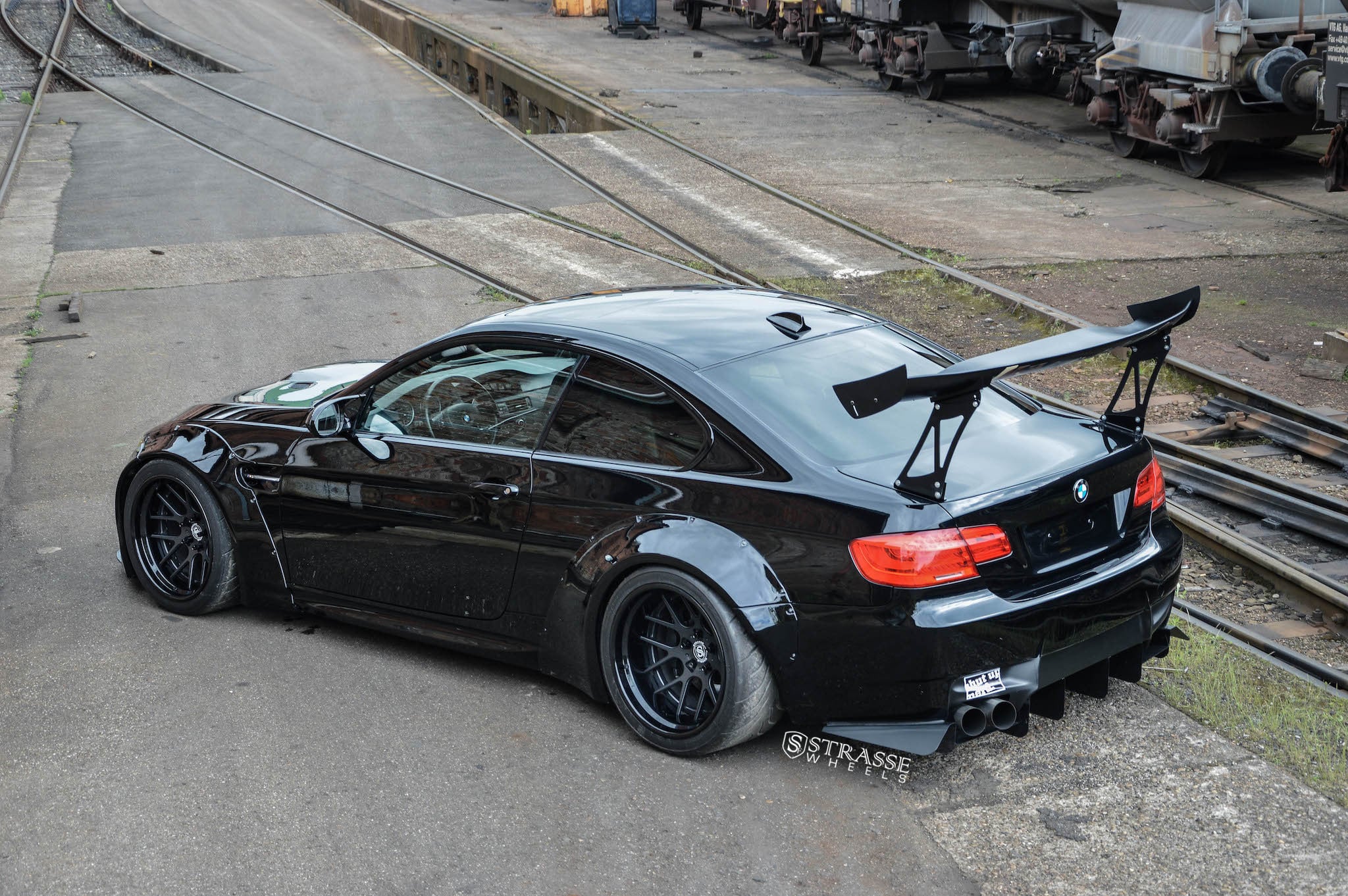 Large Sport Wing Spoiler on Black BMW 3-Series - Photo by Strasse Forged