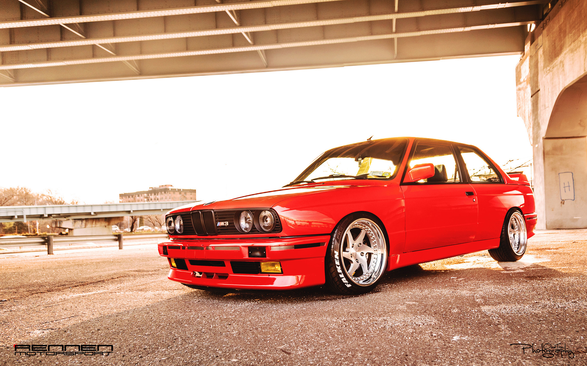 Custom Front Bumper on Red BMW 3-Series - Photo by Rennen International