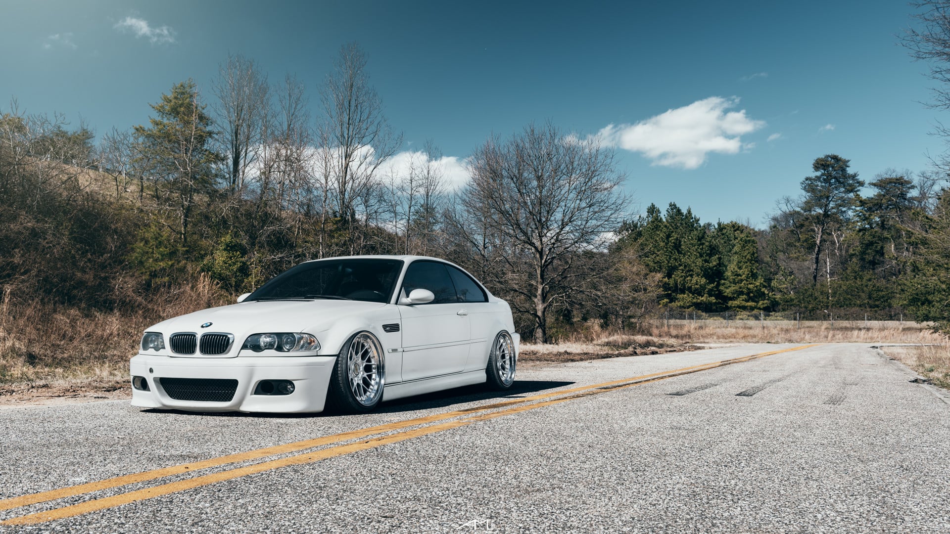 Front Bumper with Fog Lights on White BMW 3-Series - Photo by Arlen Liverman