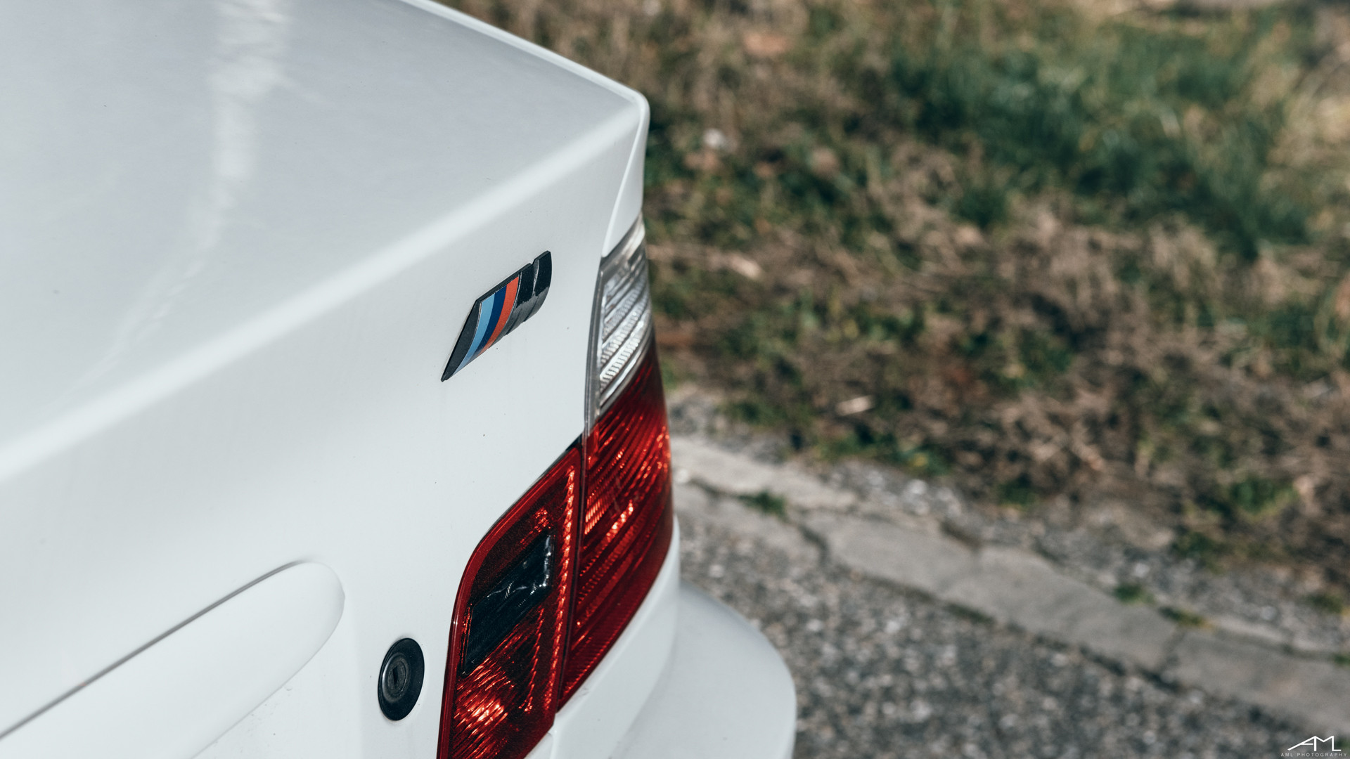 White BMW 3-Series with Red LED Taillights - Photo by Arlen Liverman