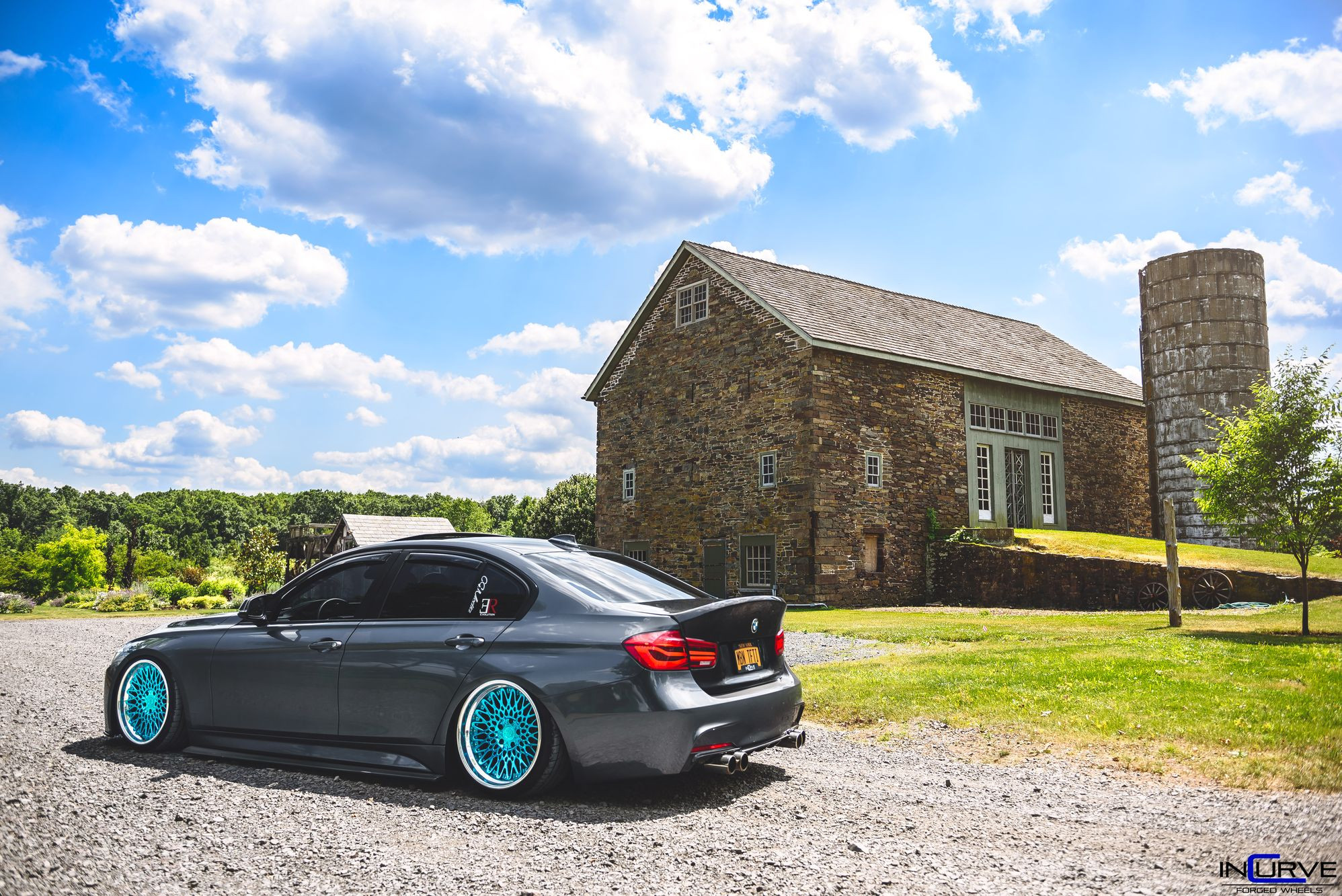 Custom Exhaust System on Gray Lowered BMW 3-Series - Photo by Incurve Wheels