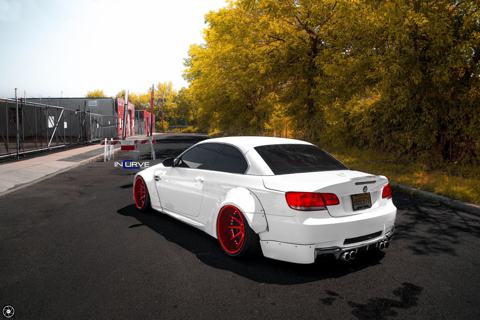 Aftermarket Fender Flares on White BMW 3-Series - Photo by Incurve Wheels