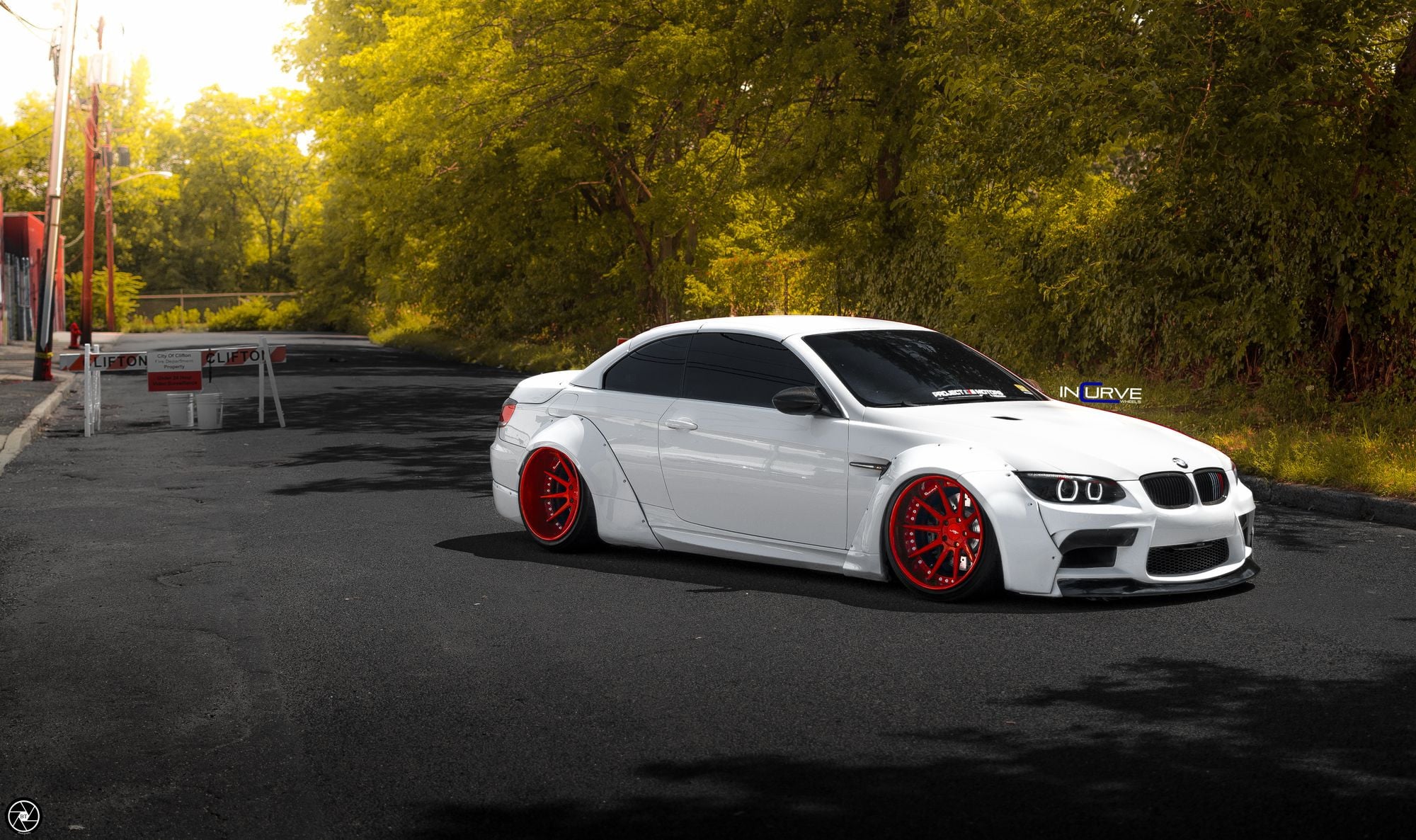White BMW 3-Series with Custom Halo Headlights - Photo by Incurve Wheels