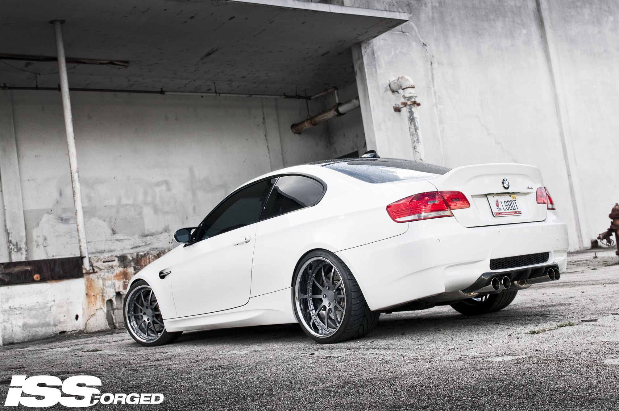 White BMW 3-Series with Custom Exhaust System - Photo by William Stern