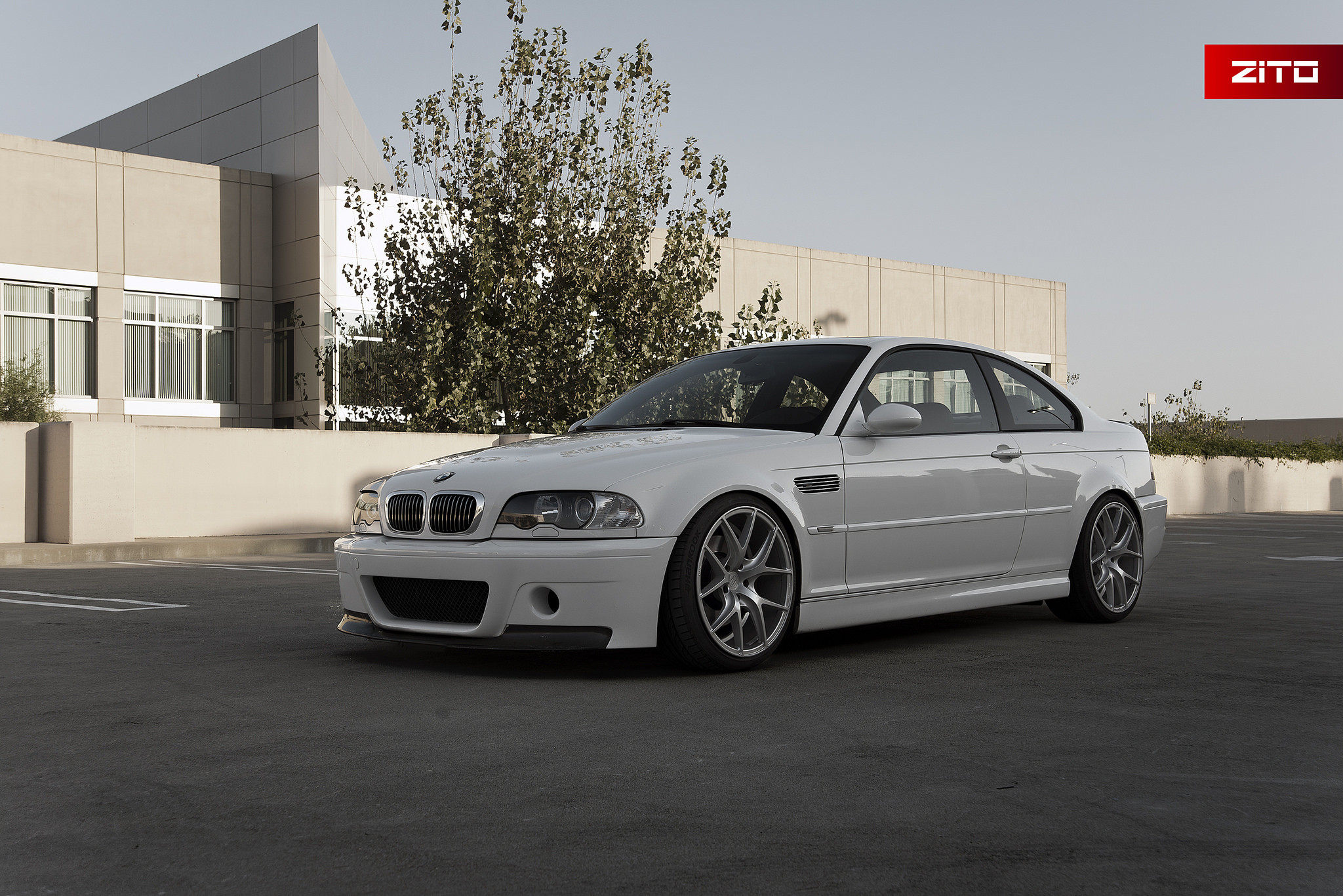 White BMW 3-Series with Chrome Billet Grille - Photo by Zito Wheels