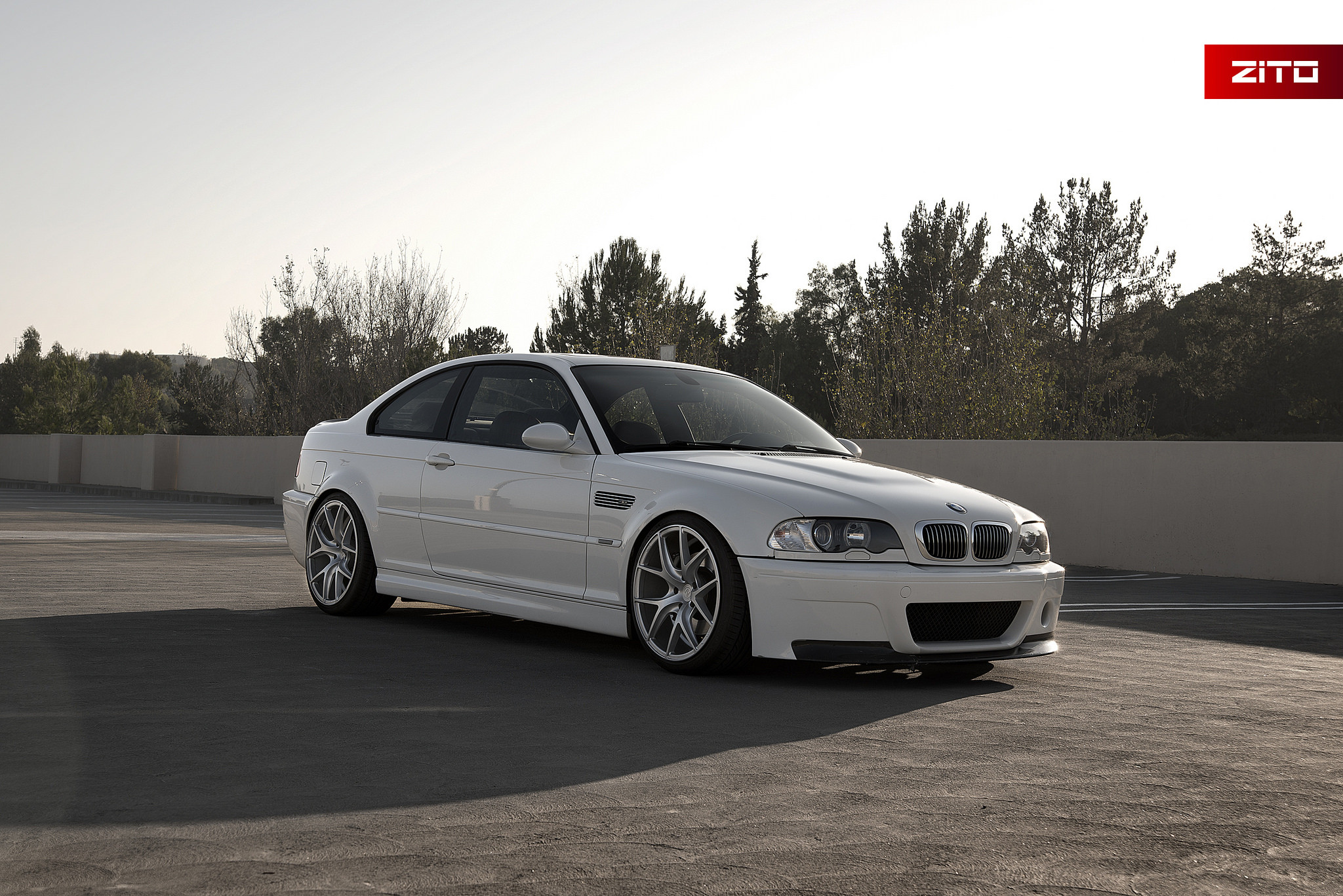 Aftermarket Front Bumper on White BMW 3-Series - Photo by Zito Wheels