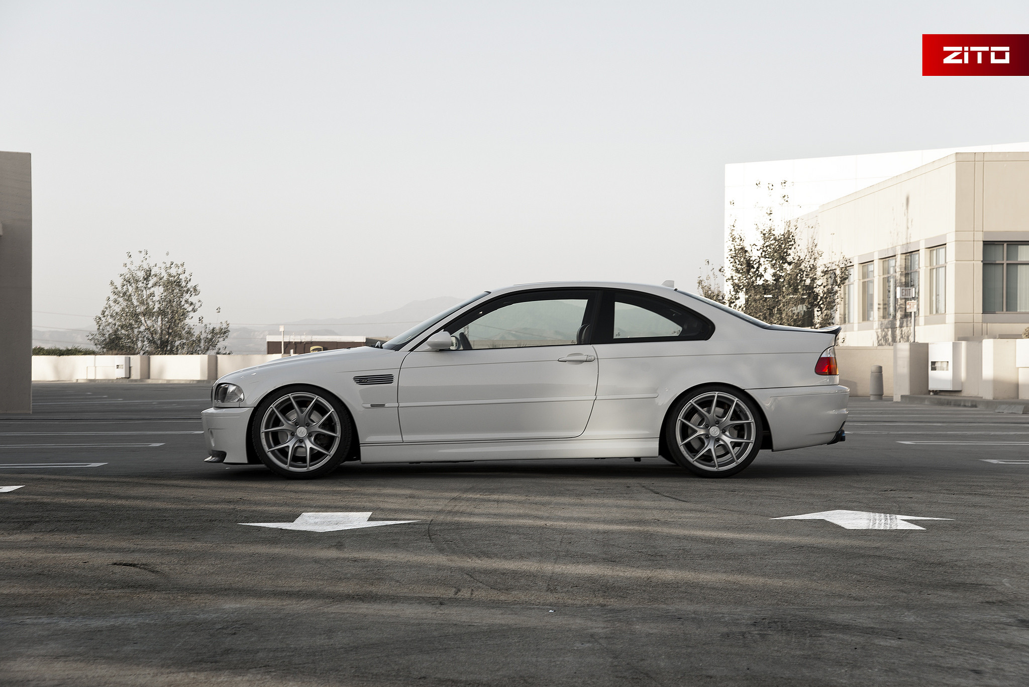 White BMW 3-Series with Aftermarket Side Vents - Photo by Zito Wheels