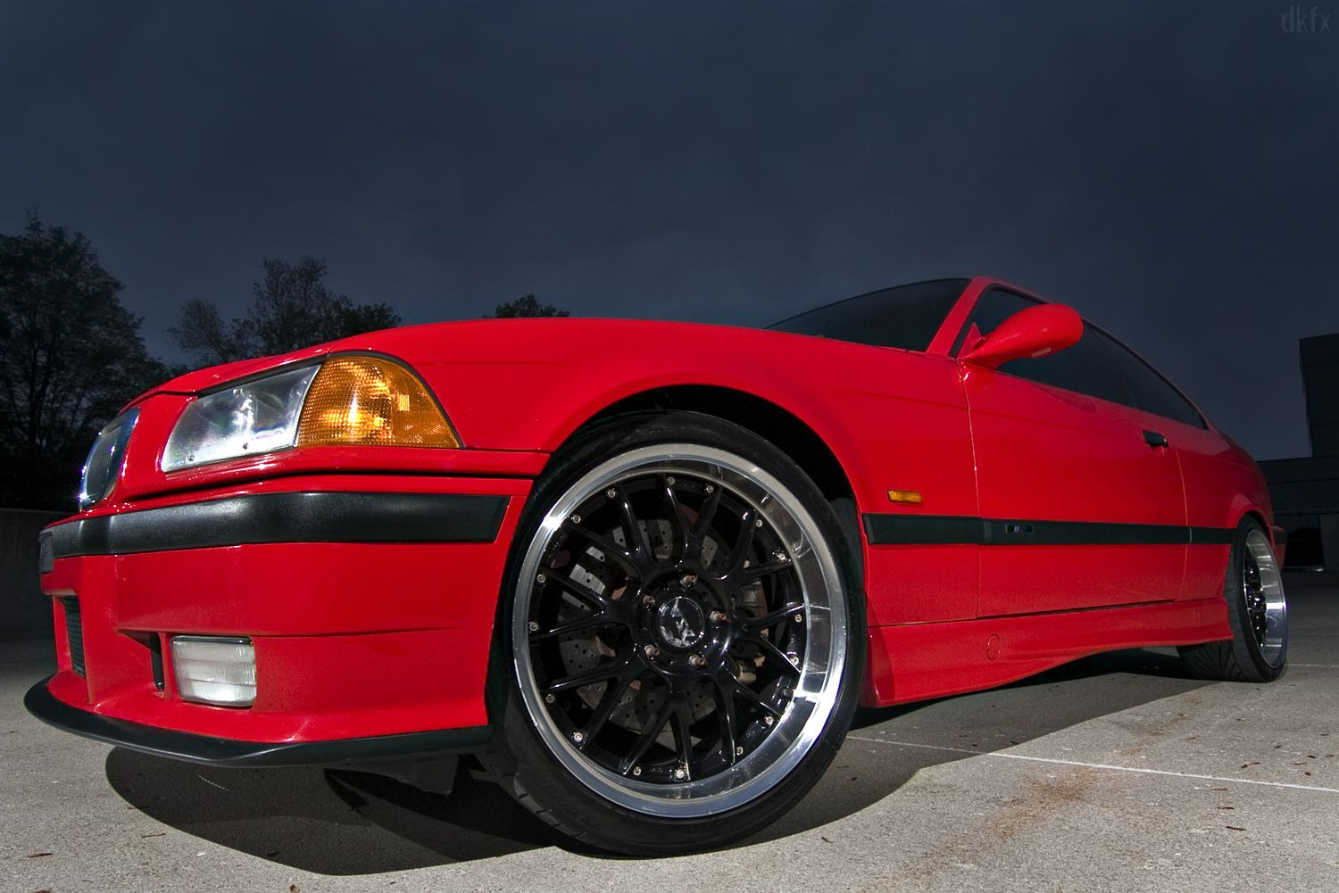 Red BMW 3-Series with Custom Front Lip - Photo by dan kinzie