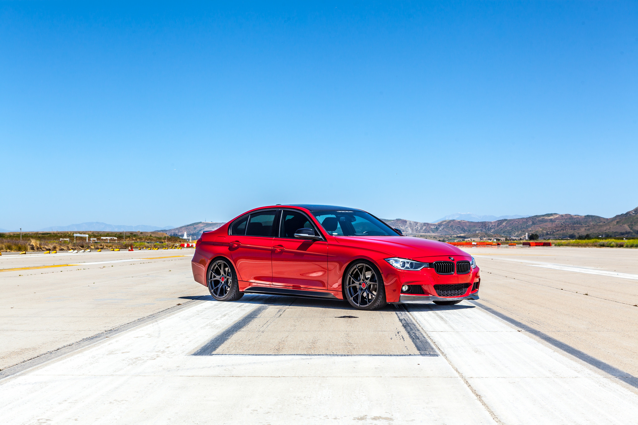 Custom Red BMW 3-Series Side Skirts  - Photo by Vorsteiner
