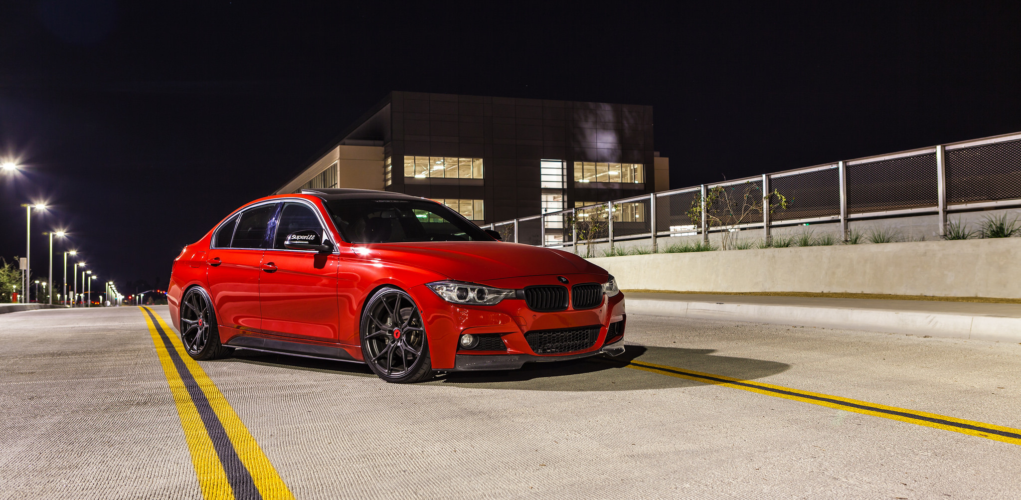 Matte Black Vorsteiner Rims on Red BMW 3-Series - Photo by Vorsteiner