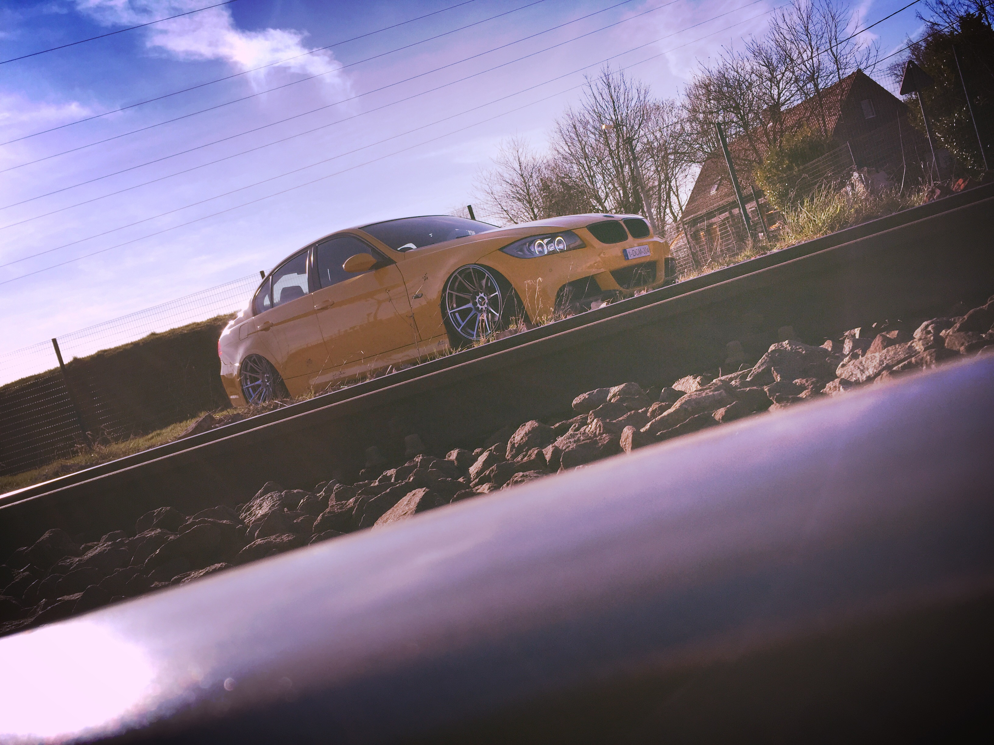 Yellow BMW 3-Series with Aftermarket Side Skirts - Photo by JR Wheels