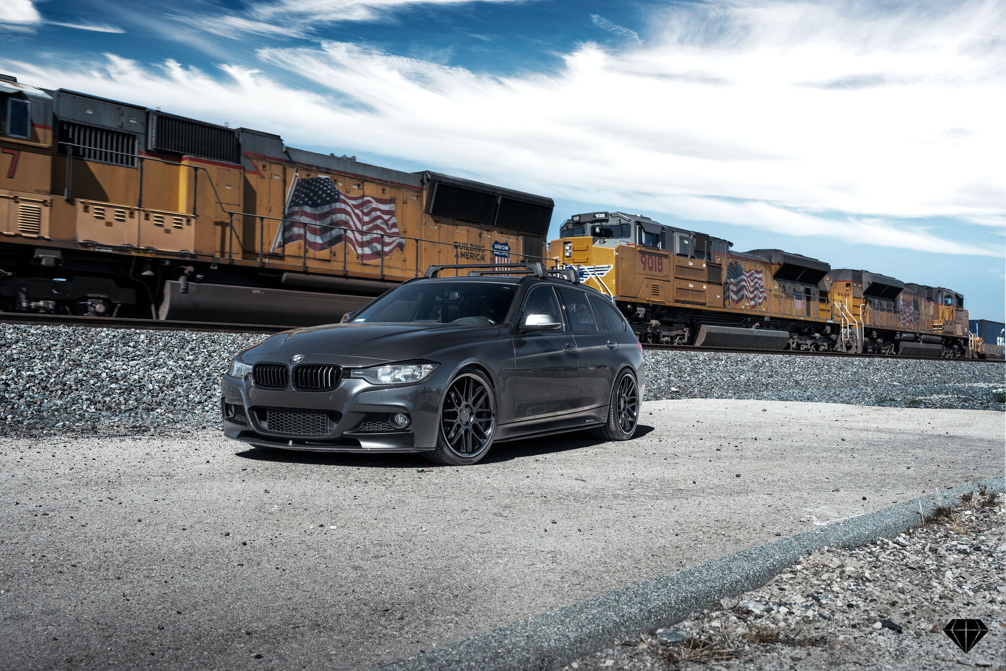 Aftermarket Front Bumper on Gray BMW 3-Series - Photo by Blaque Diamond Wheels