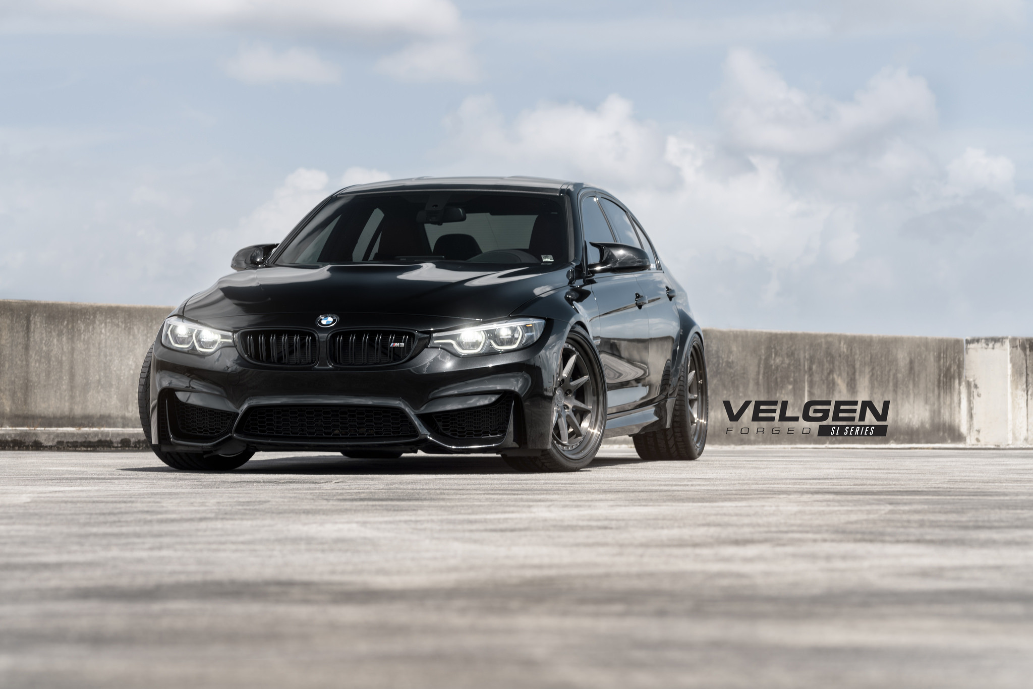 Crystal Clear Halo Headlights on Black BMW 3-Series - Photo by Velgen Wheels