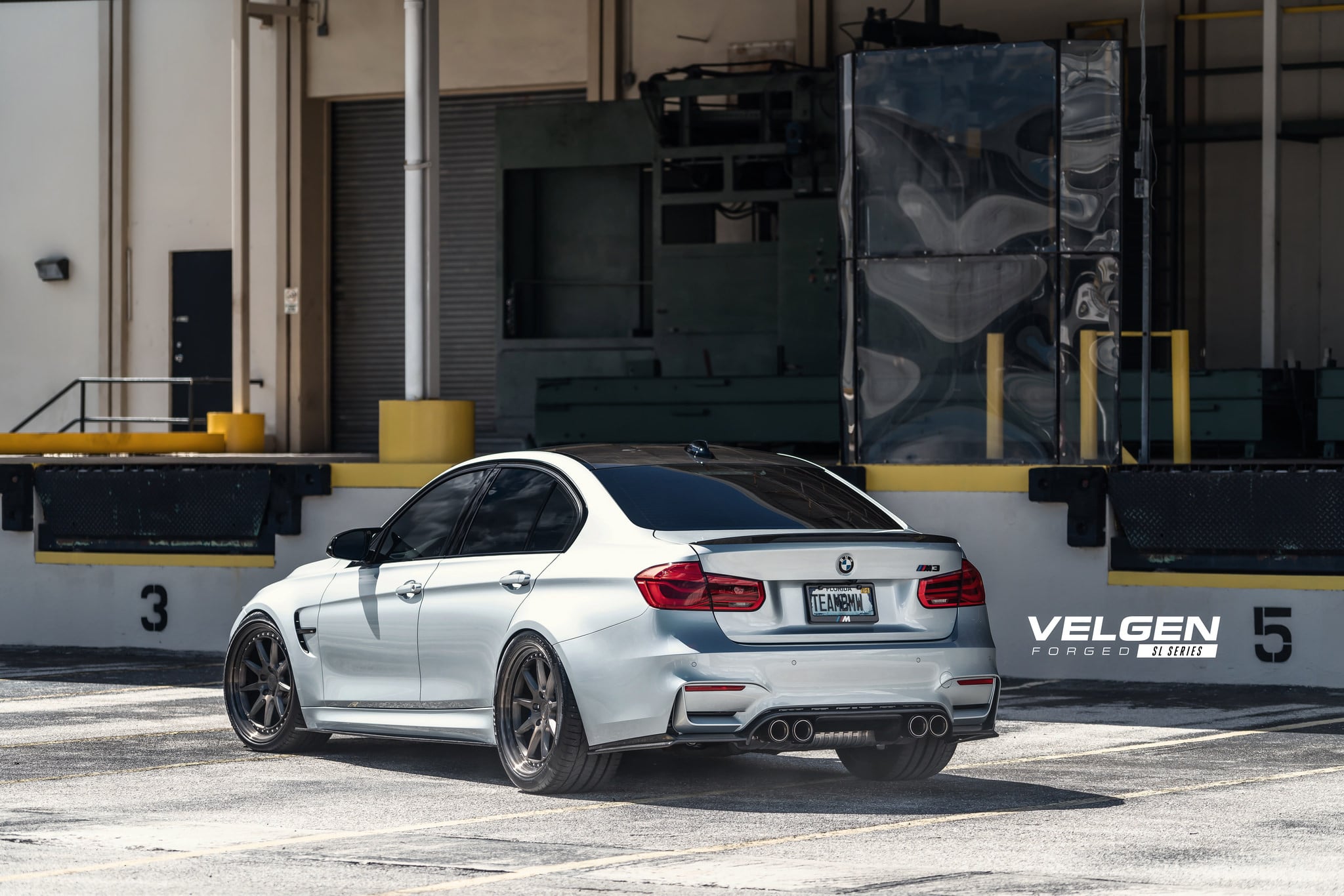 Carbon Fiber Rear Lip Spoiler on Silver BMW 3-Series - Photo by Velgen Wheels