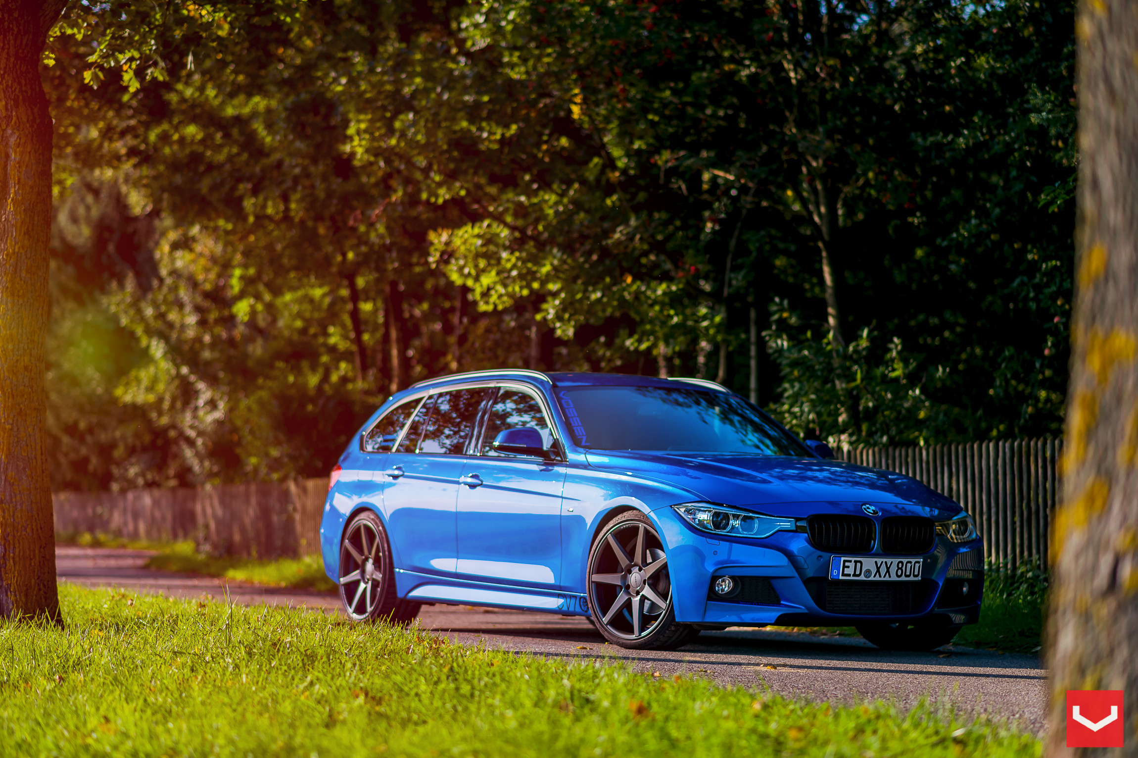 Aftermarket Side Skirts on Blue BMW 3-Series - Photo by Vossen