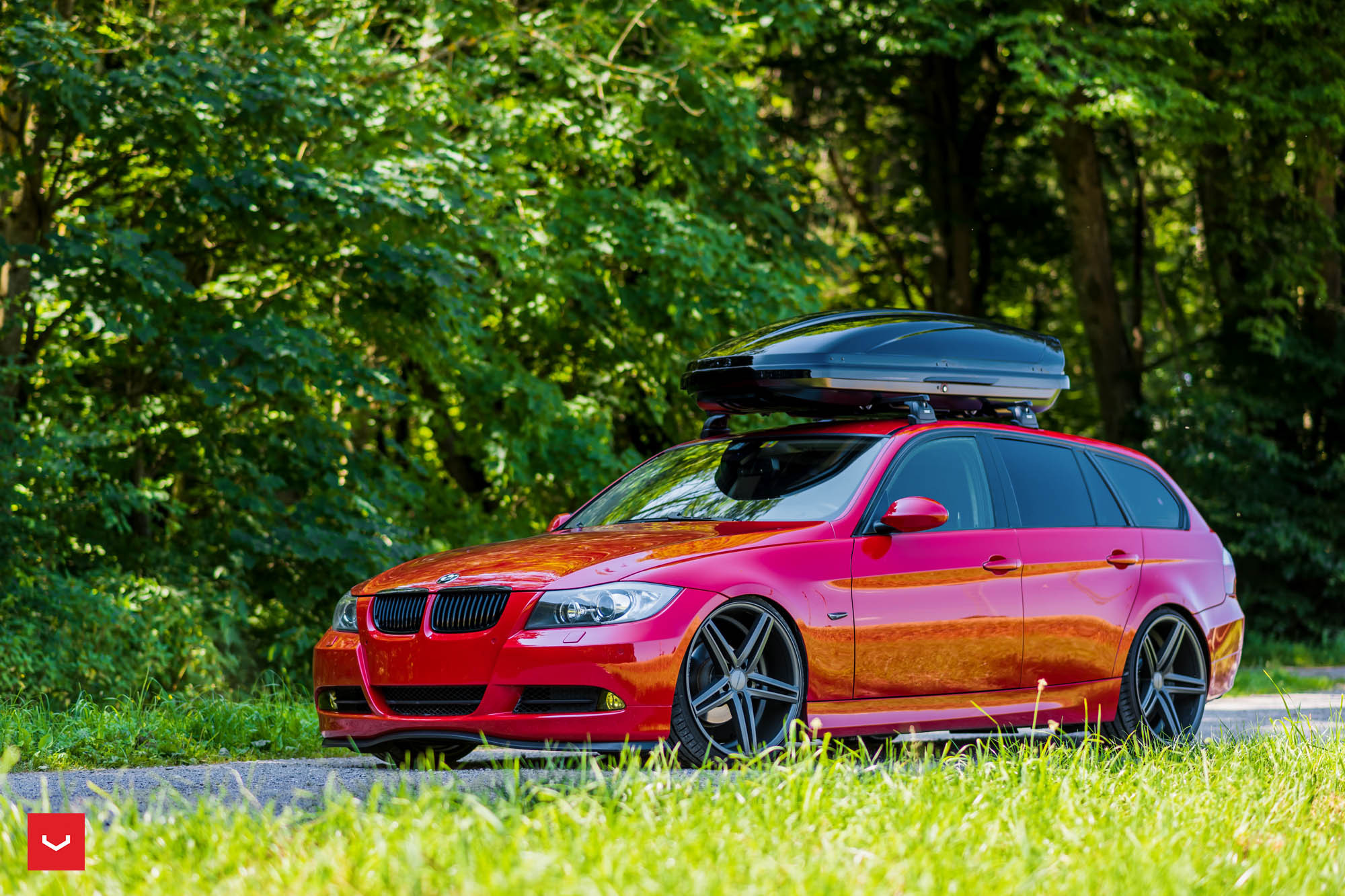 Custom Front Bumper Cover on Red BMW 3-Series - Photo by Vossen