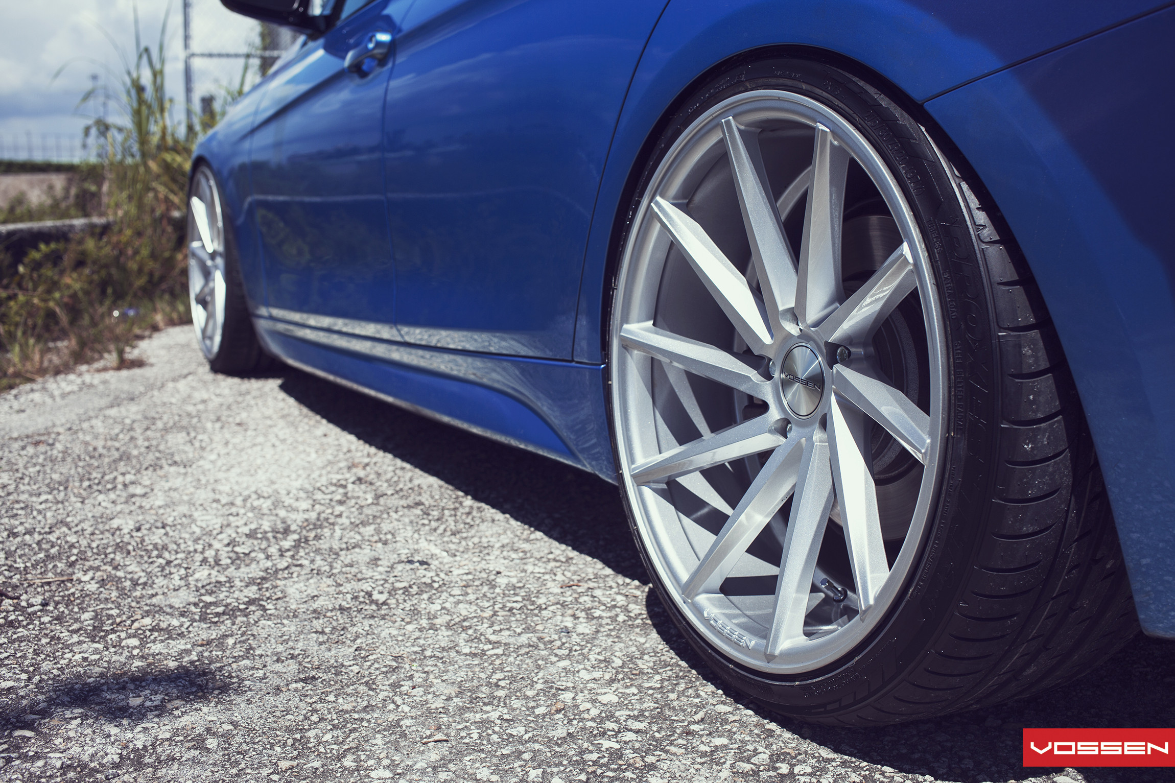 Custom Chrome Vossen Wheels on Blue BMW 3-Series - Photo by Vossen