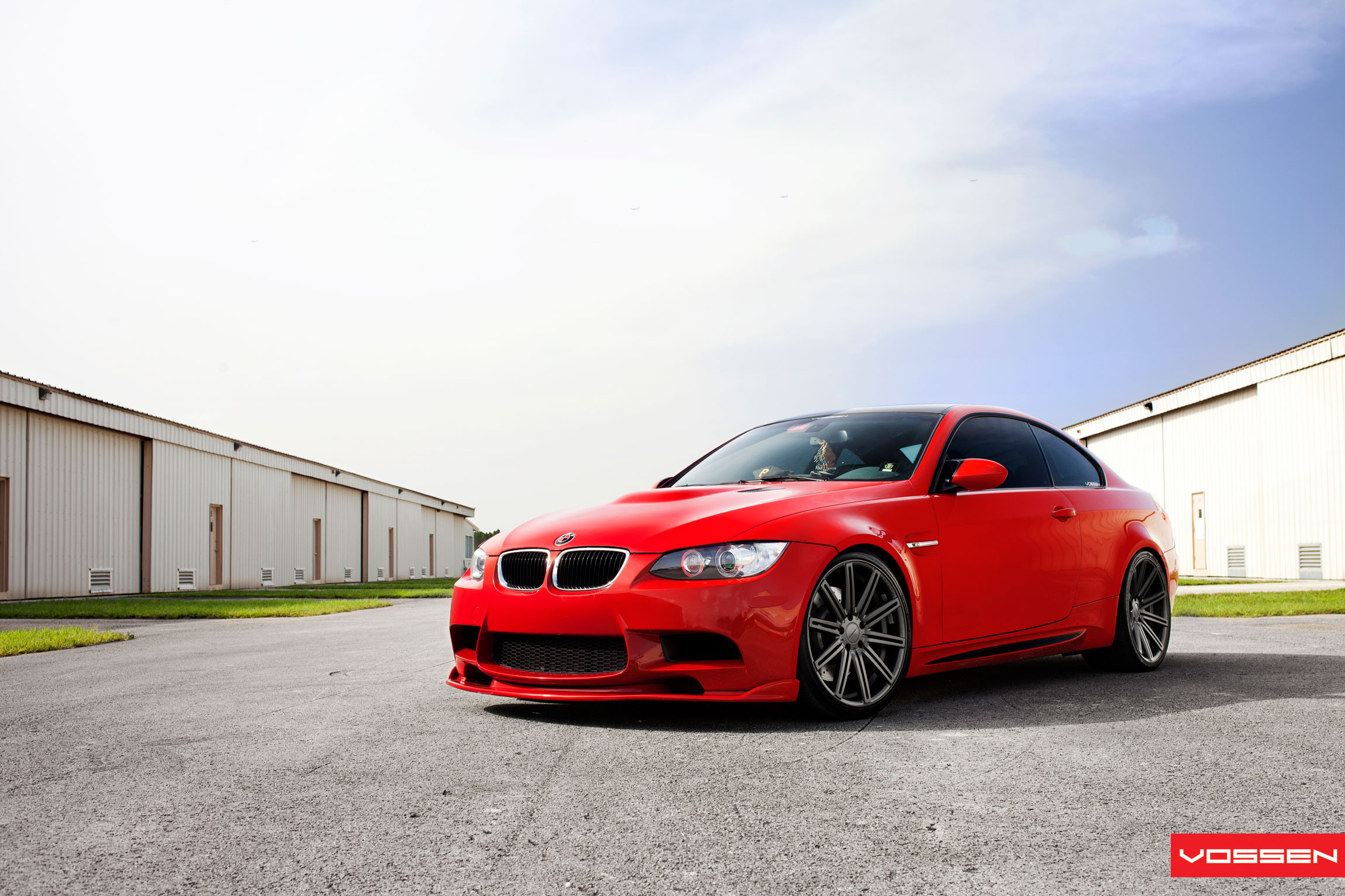 Red BMW 3-Series with Aftermarket Headlights - Photo by Vossen