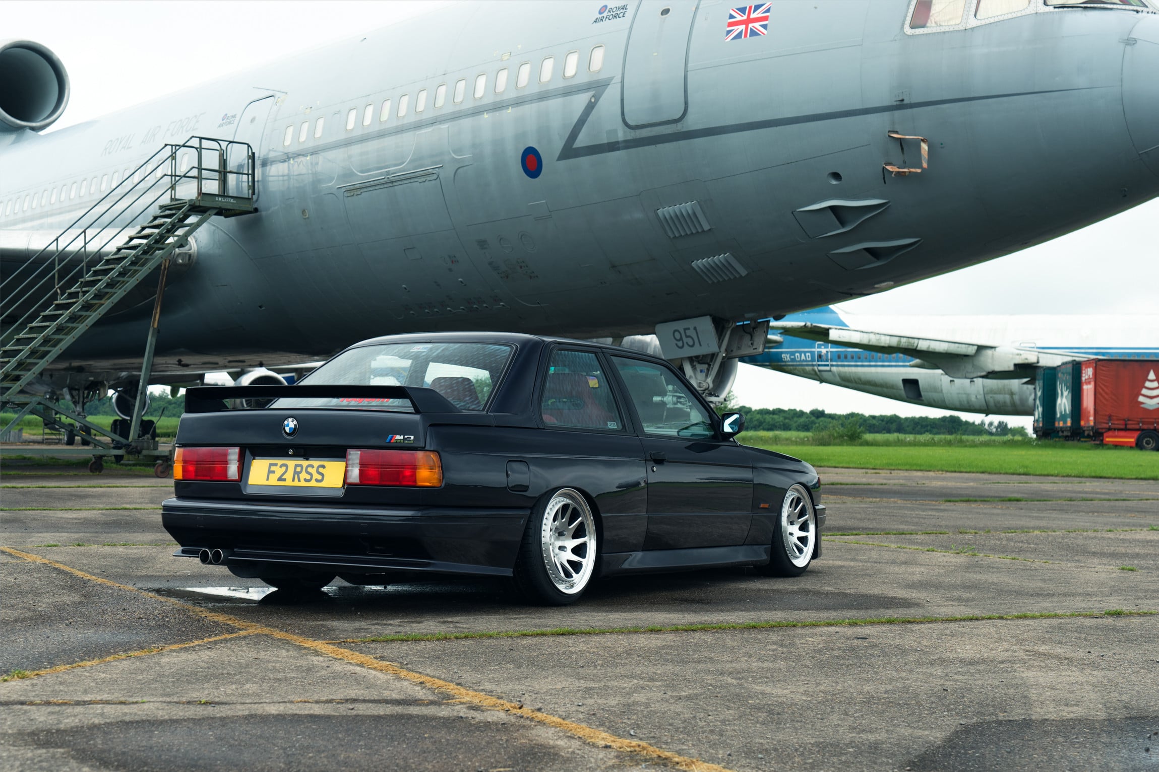 Aftermarket Rear Spoiler on Black BMW 3-Series - Photo by Rotiform