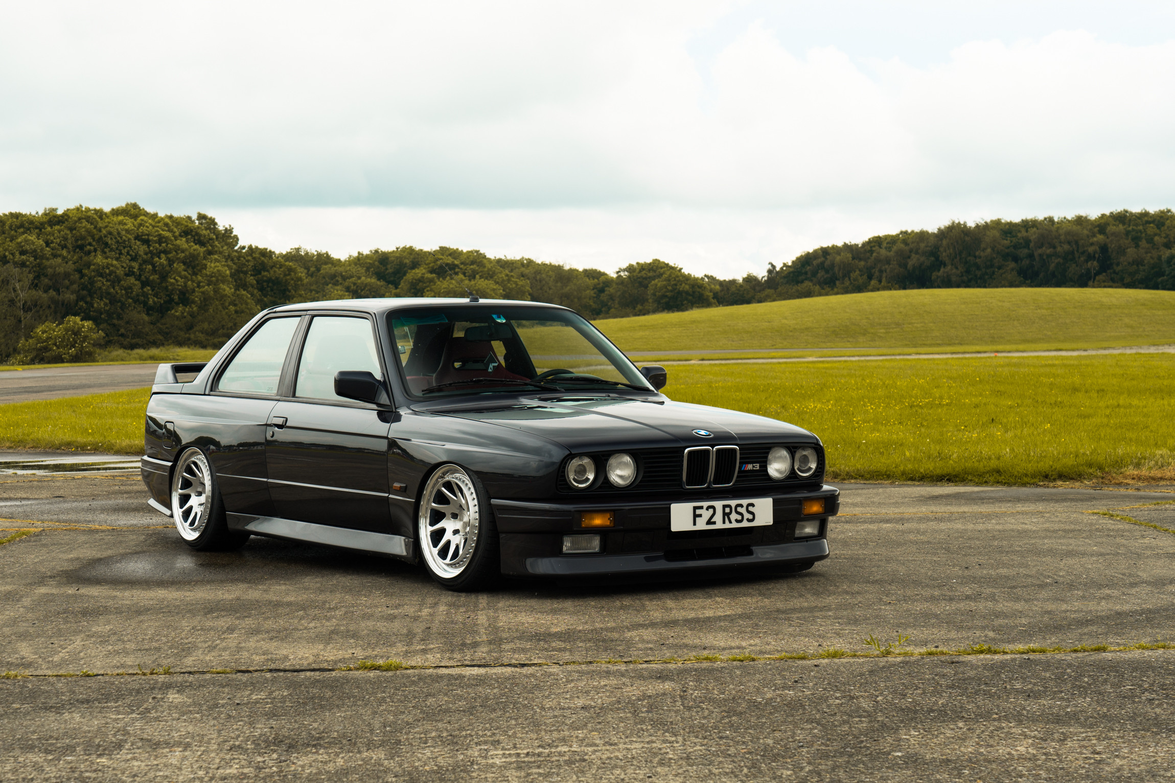 Polished Rotiform Wheels on Black BMW 3-Series - Photo by Rotiform