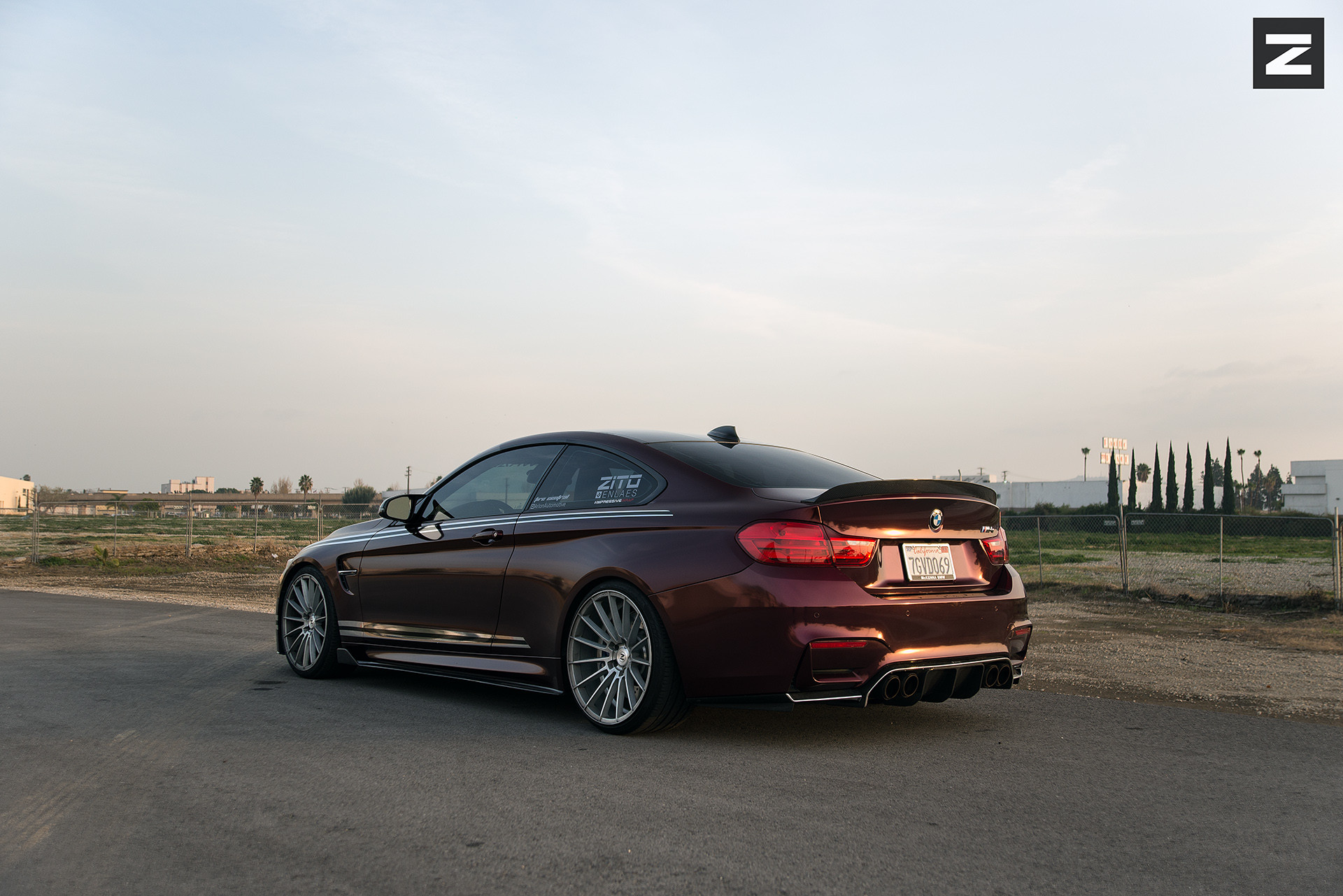 Red Debadged BMW 4-Series with Aftermarket Side Skirts - Photo by Zito Wheels