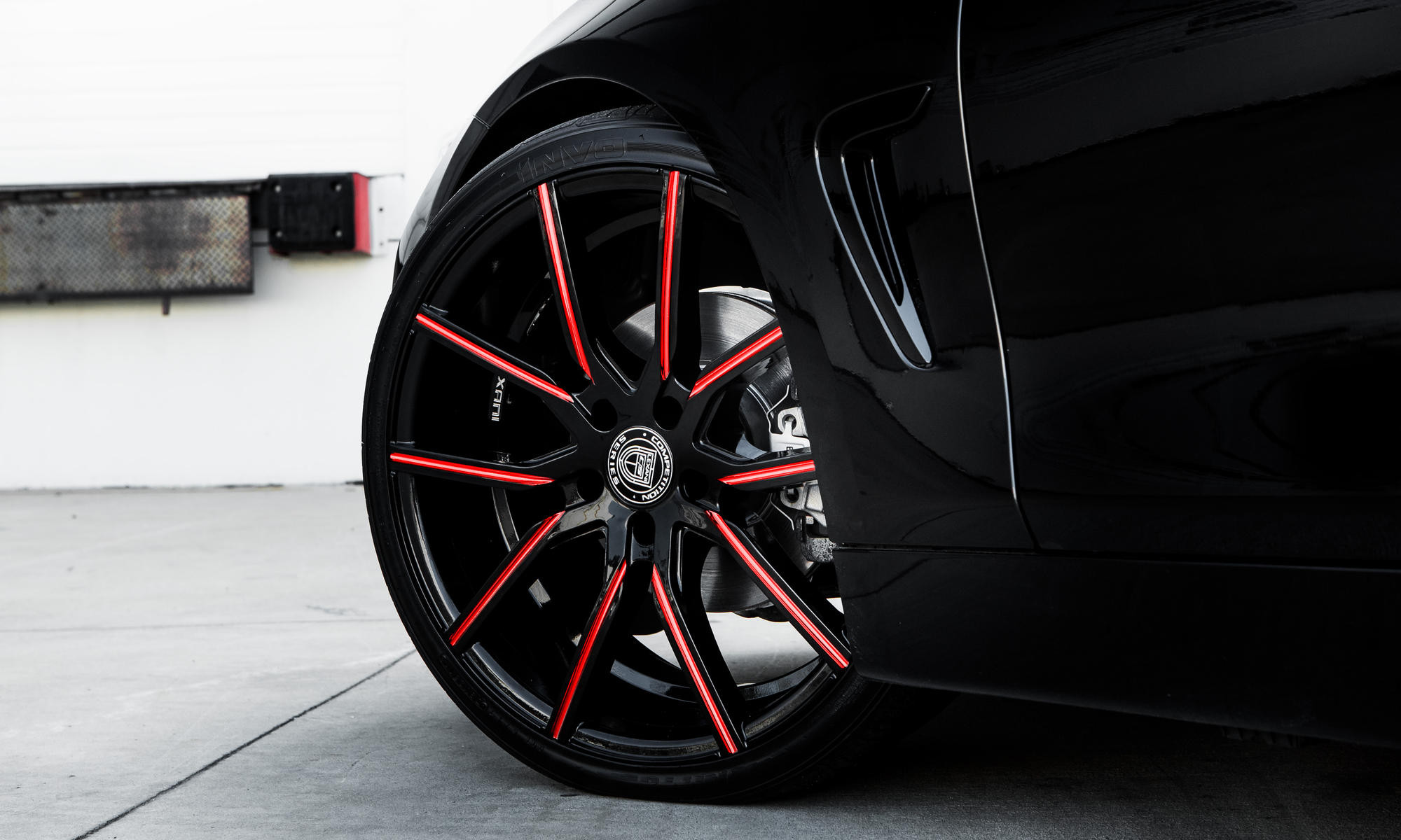 Gravity Lexani Wheels with Red Accents on Black BMW - Photo by Lexani