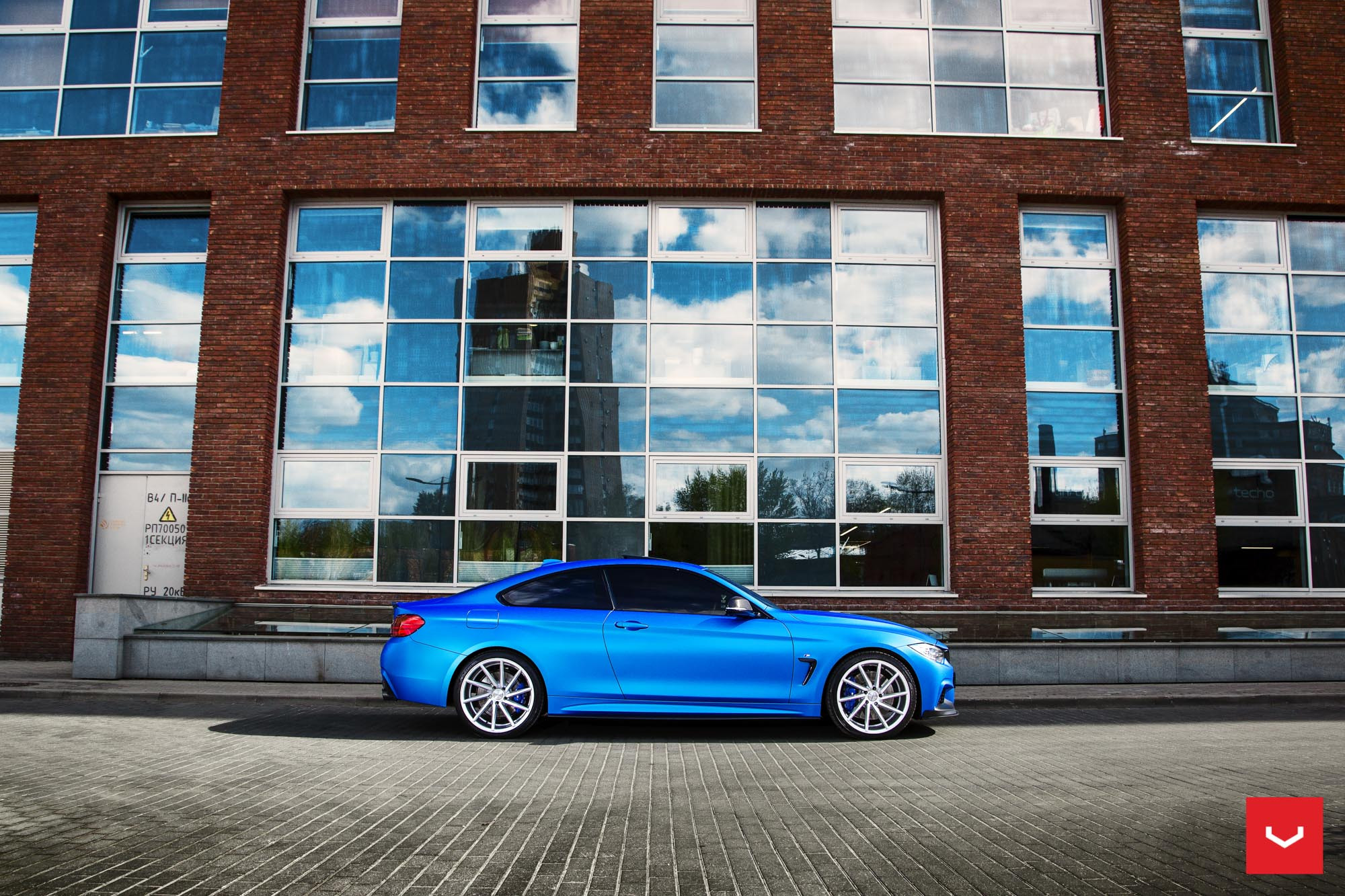 Vossen Chrome Wheels with Blue Brakes on BMW 4-Series - Photo by Vossen