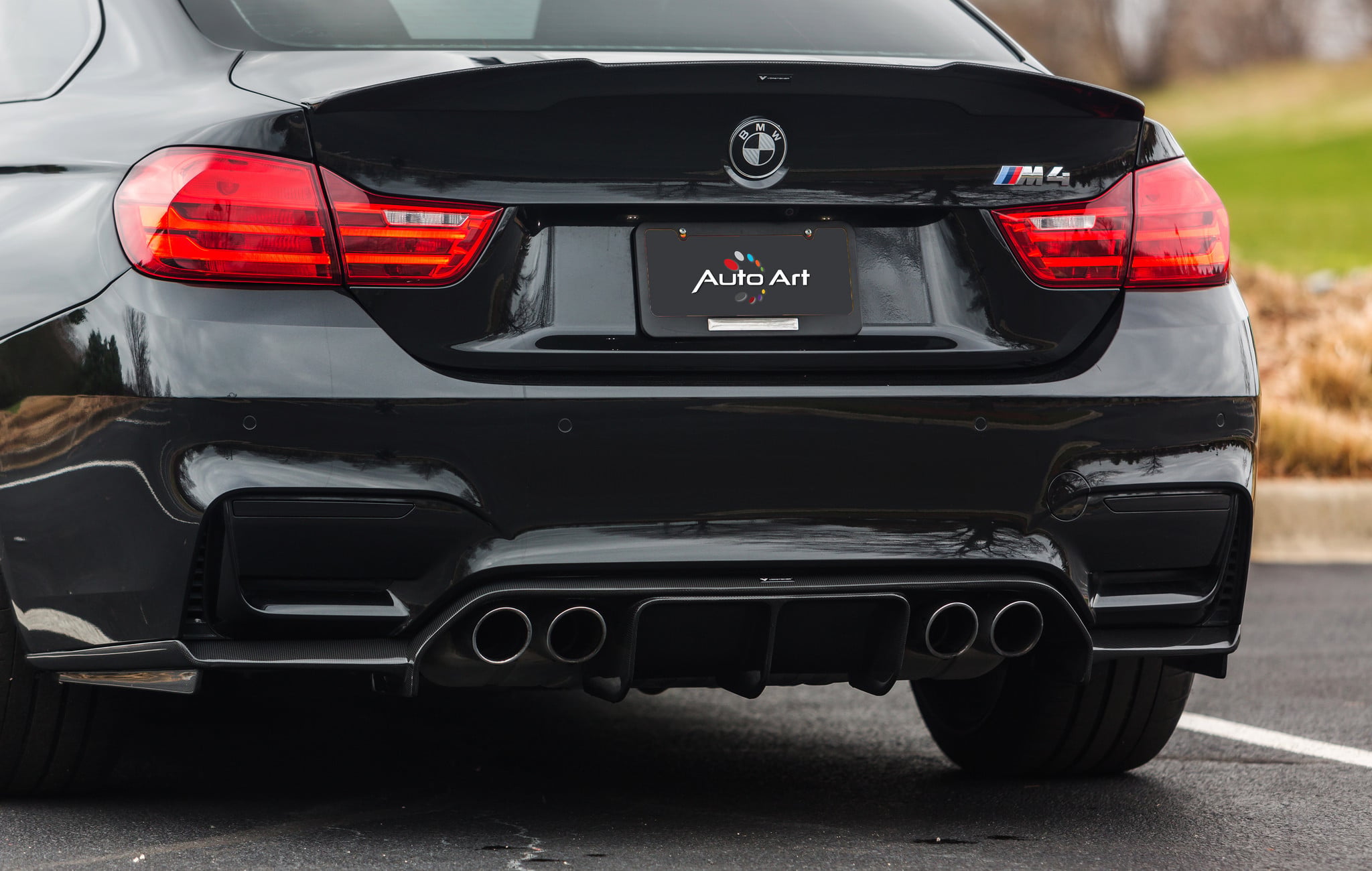 Aftermarket Rear Diffuser on Black BMW 4-Series - Photo by Vorstiner