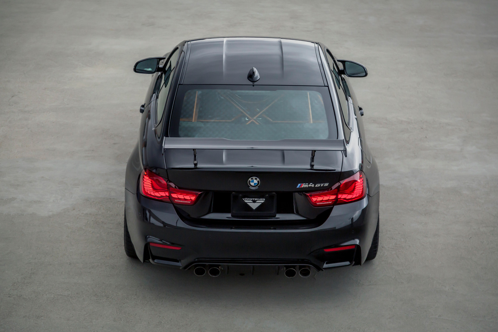 Black BMW 4-Series with Trunk Suspension Unit - Photo by Vorstiner