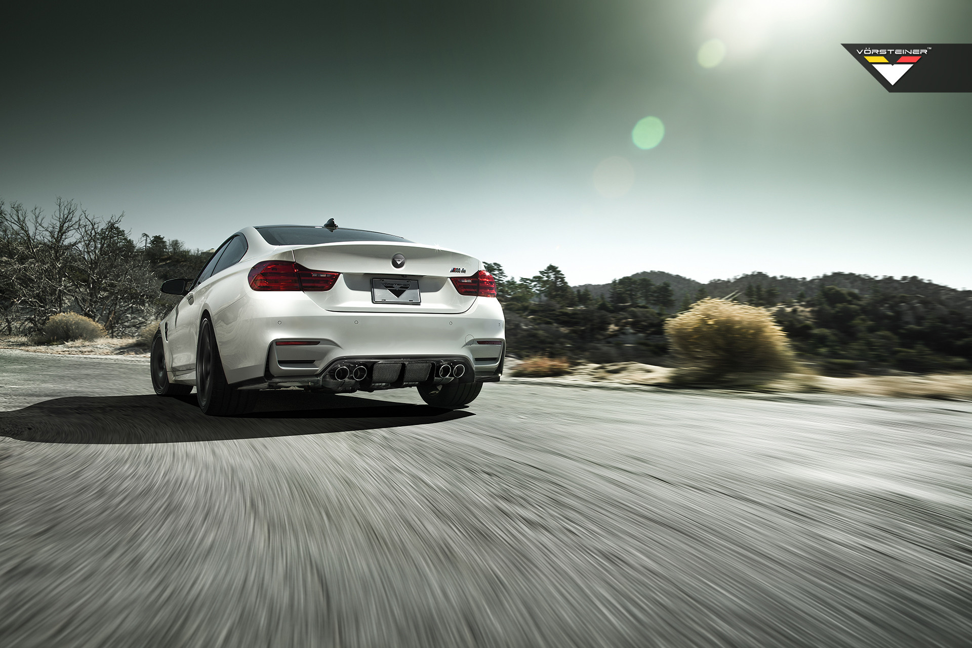 Carbon Fiber Diffuser on Custom White BMW 4-Series - Photo by Vorstiner