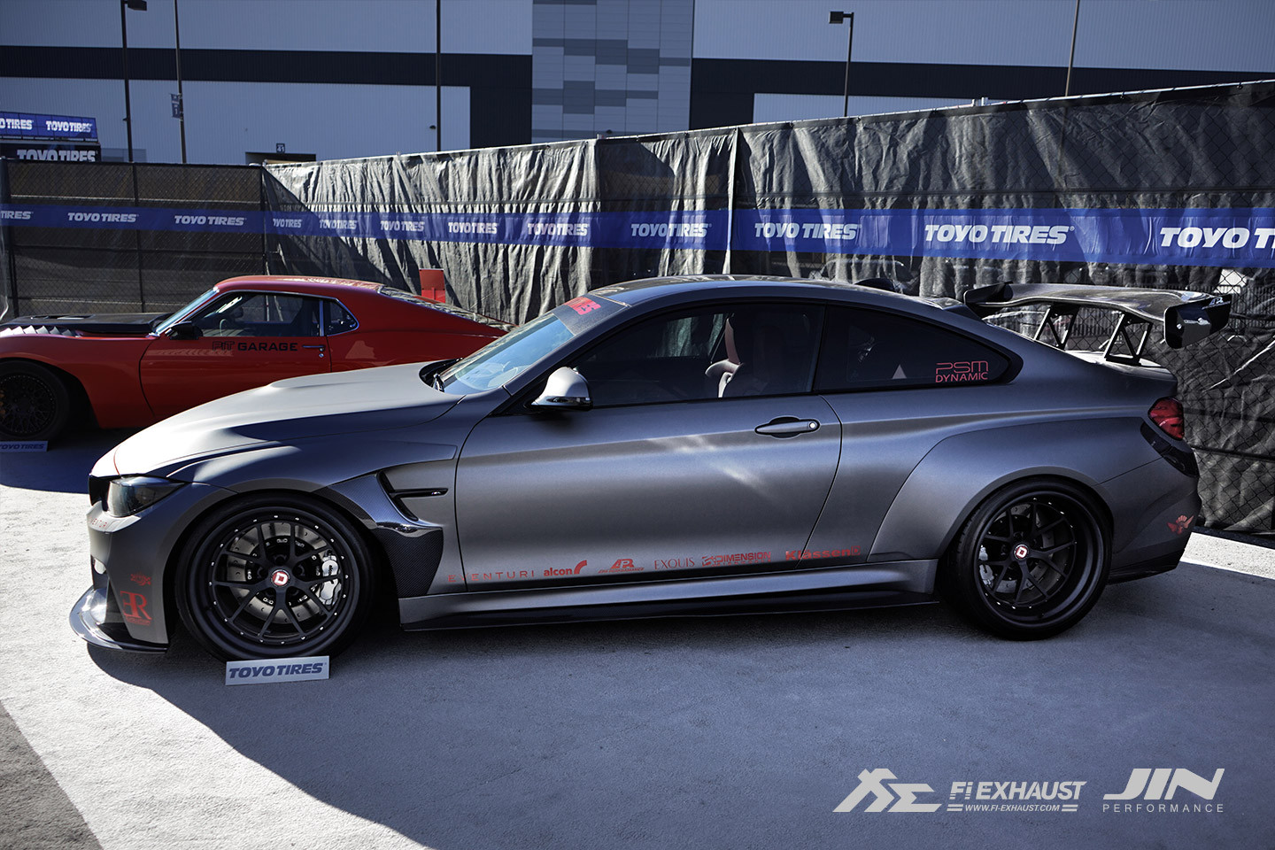 Matte Black Custom Rims on Yellow BMW 4-Series - Photo by Fi exhaust