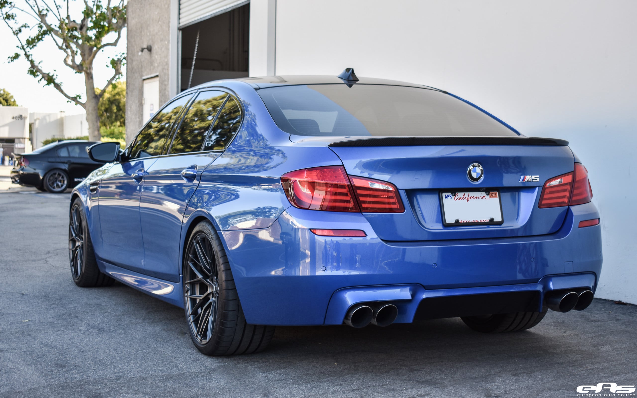 Blue BMW 5-Series with Factory Style Rear Spoiler - Photo by Vorstiner
