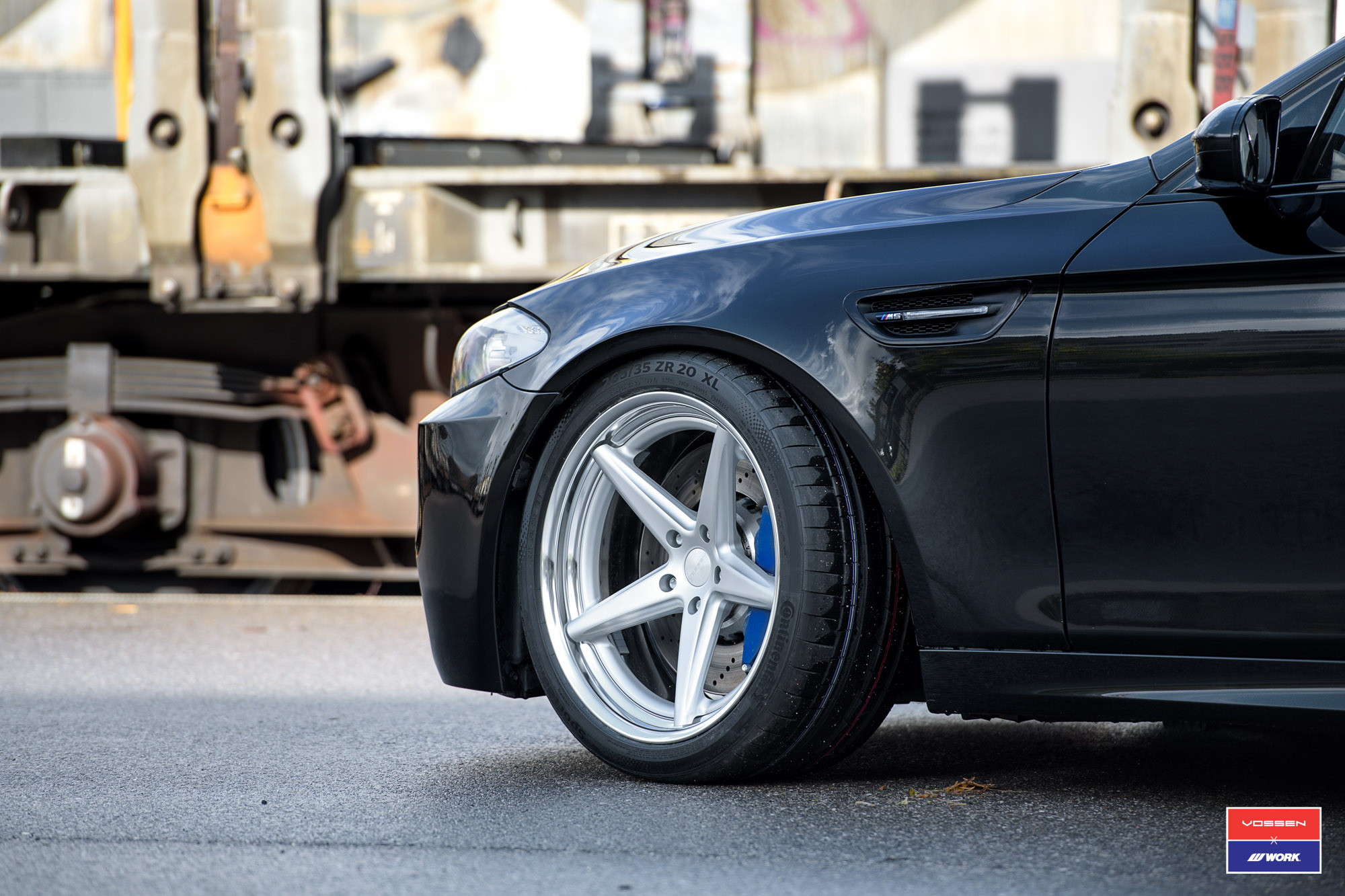 Vossen Chrome Rims with Blue Brakes on Black BMW 5-Series - Photo by Vossen