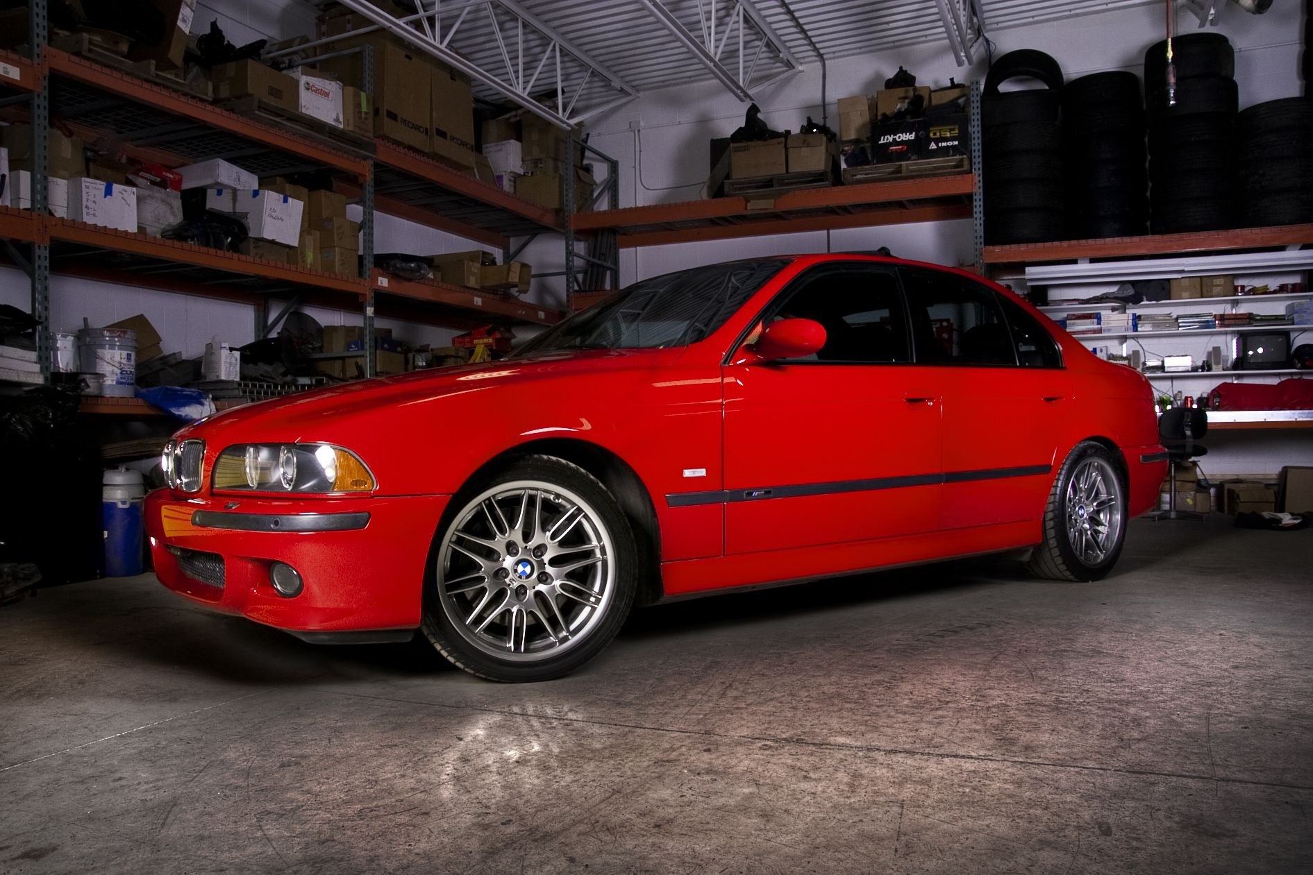 Front Bumper with Fog Lights on Red BMW 5-Series - Photo by dan kinzie