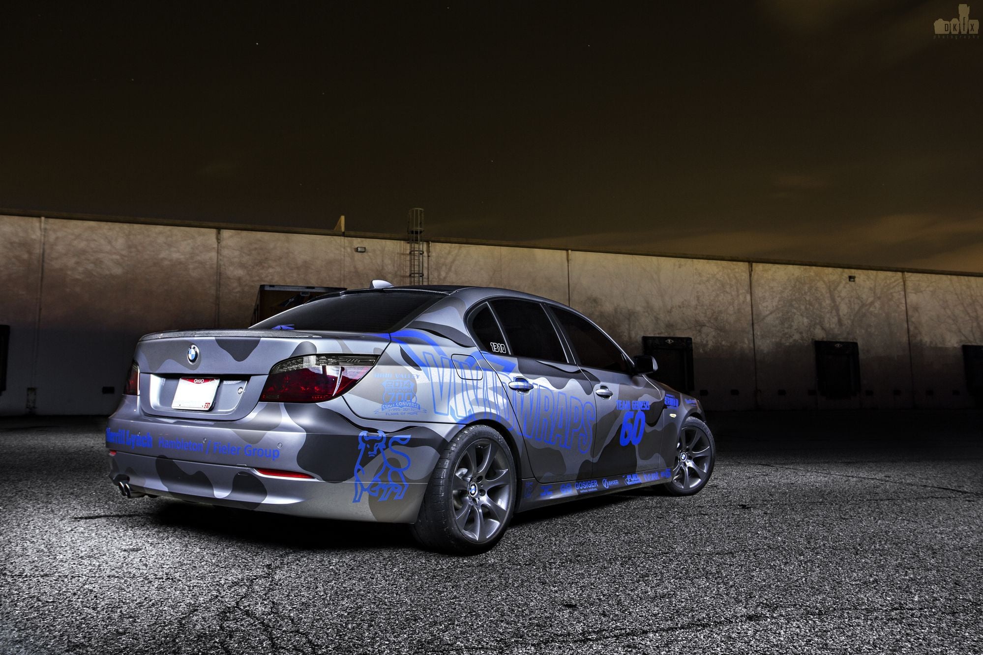 Gray Debadged BMW 5-Series with Carbon Fiber Lip Spoiler - Photo by dan kinzie
